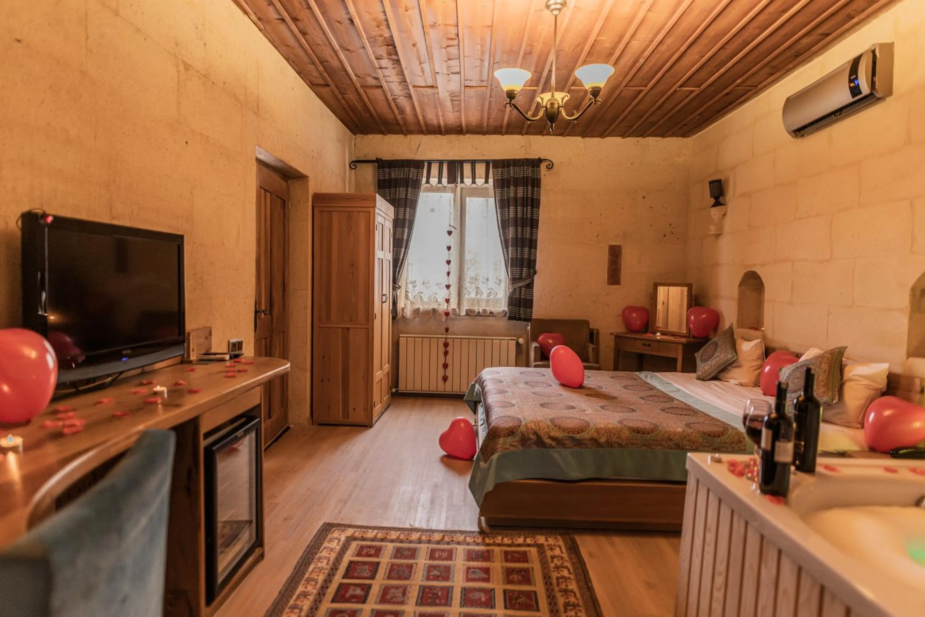 Bed in La Casa Cave Hotel