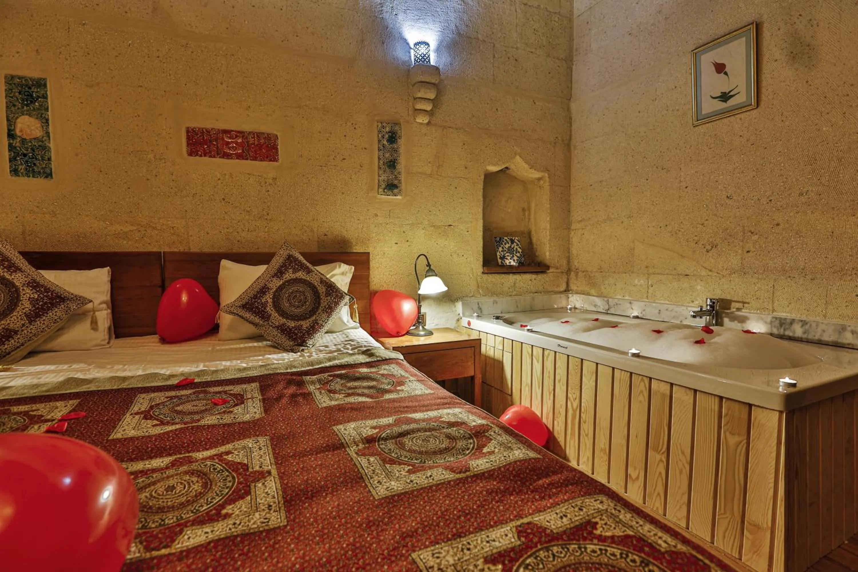 Bed in La Casa Cave Hotel