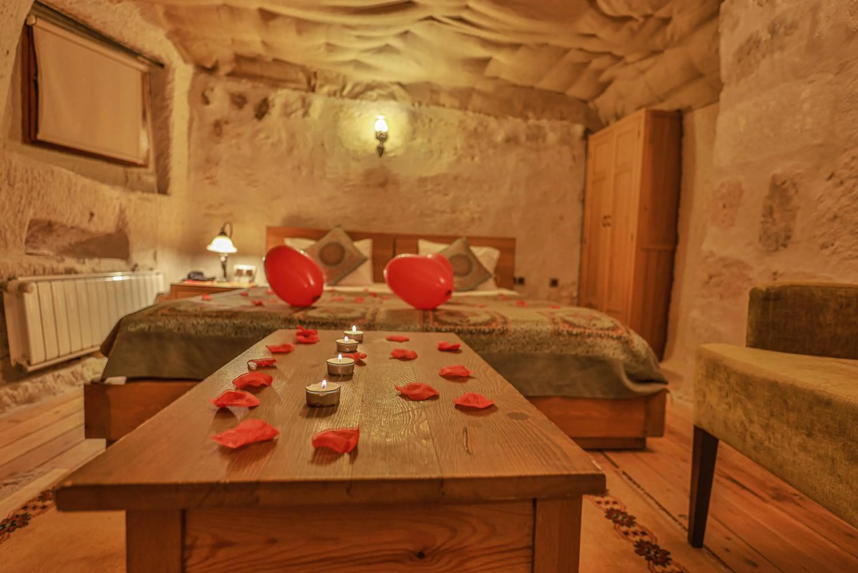 Bed in La Casa Cave Hotel