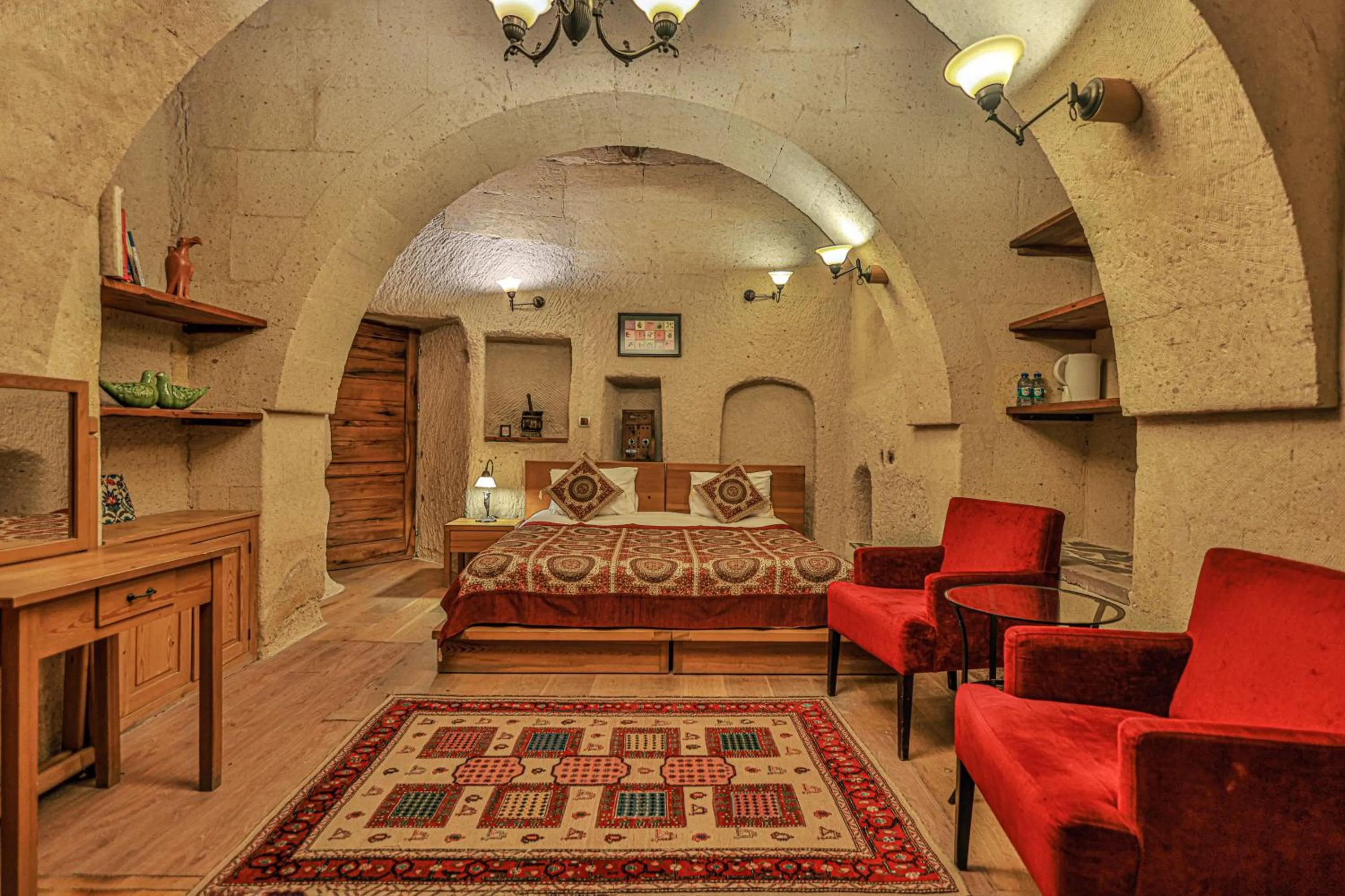 Bed in La Casa Cave Hotel