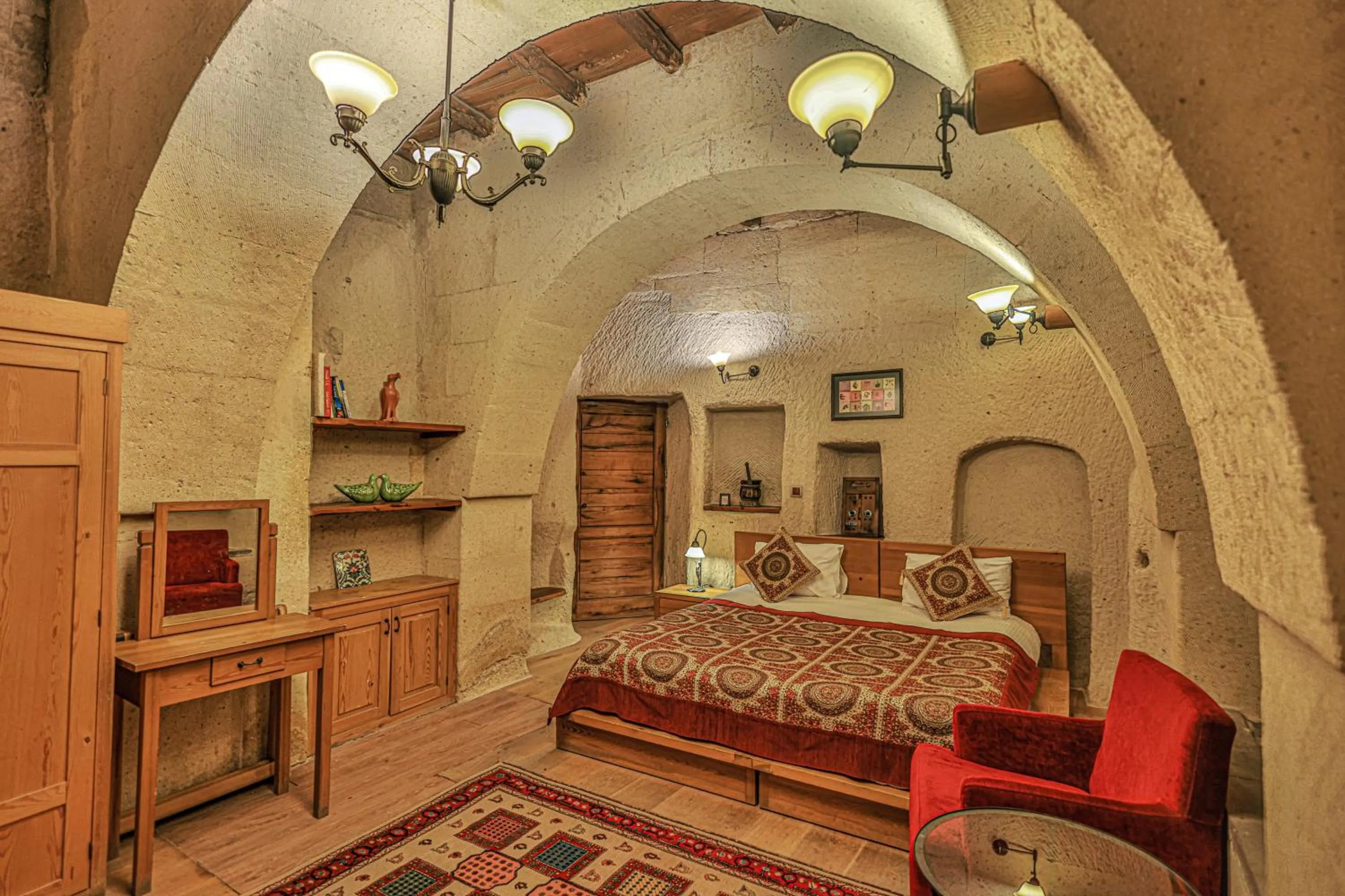 Bed in La Casa Cave Hotel