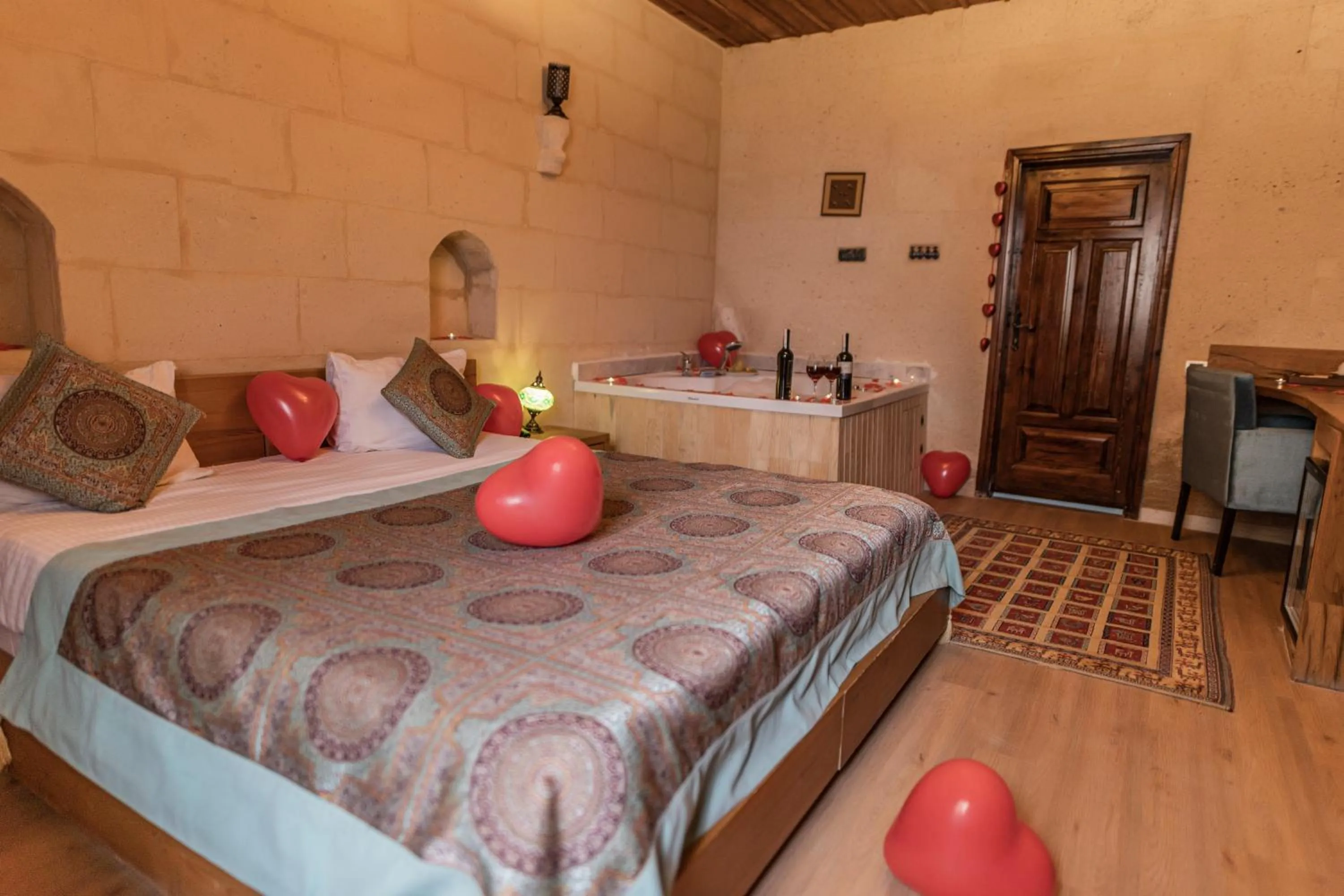 Bed in La Casa Cave Hotel