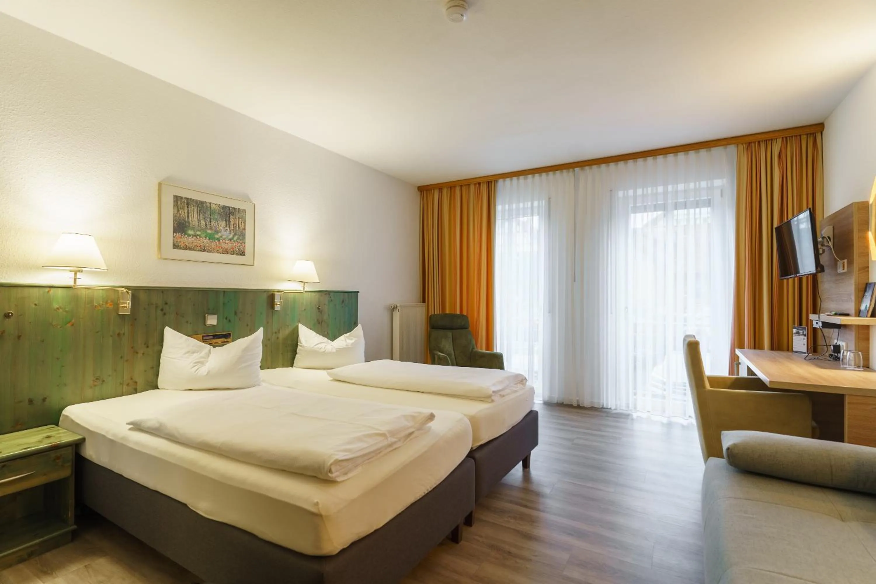 Photo of the whole room, Bed in Stadthotel Pfeffermühle