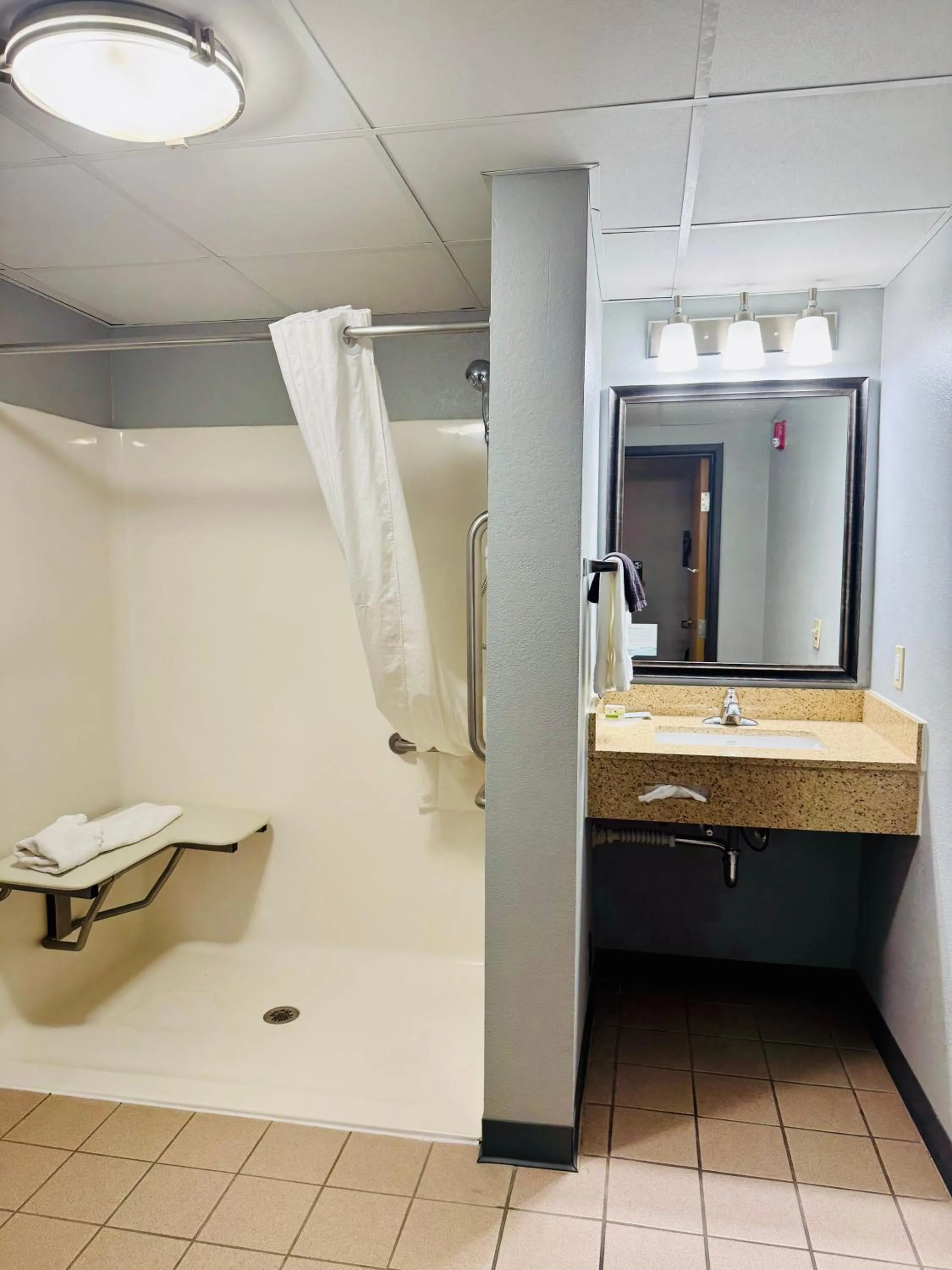 Shower in AmericInn by Wyndham Stillwater