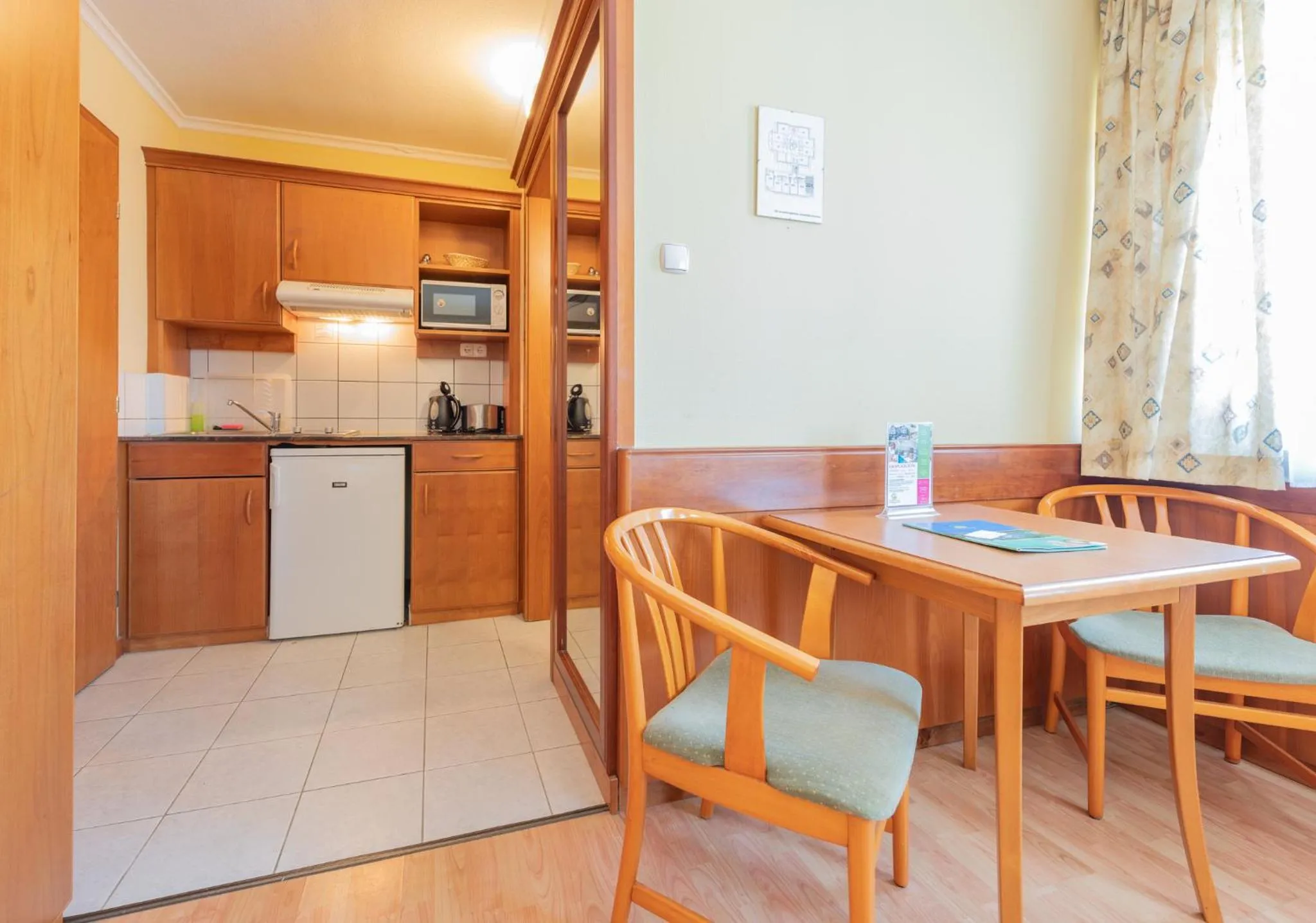 Dining area in Holiday Club Apartman Hotel