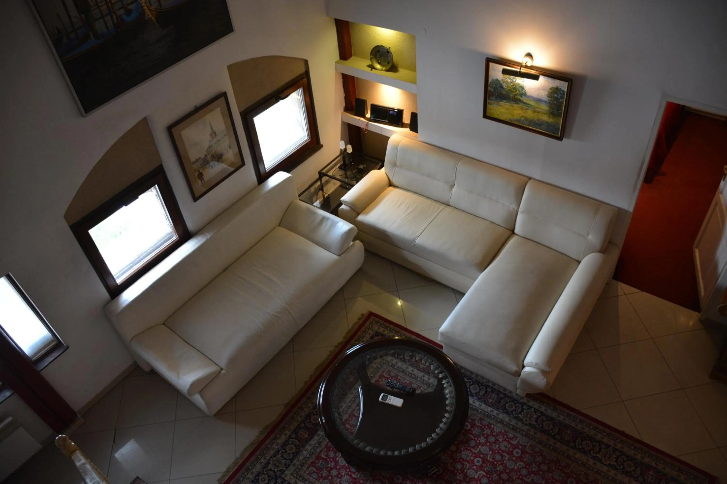 TV and multimedia in Residence B&B La Fontaine Aparthotel