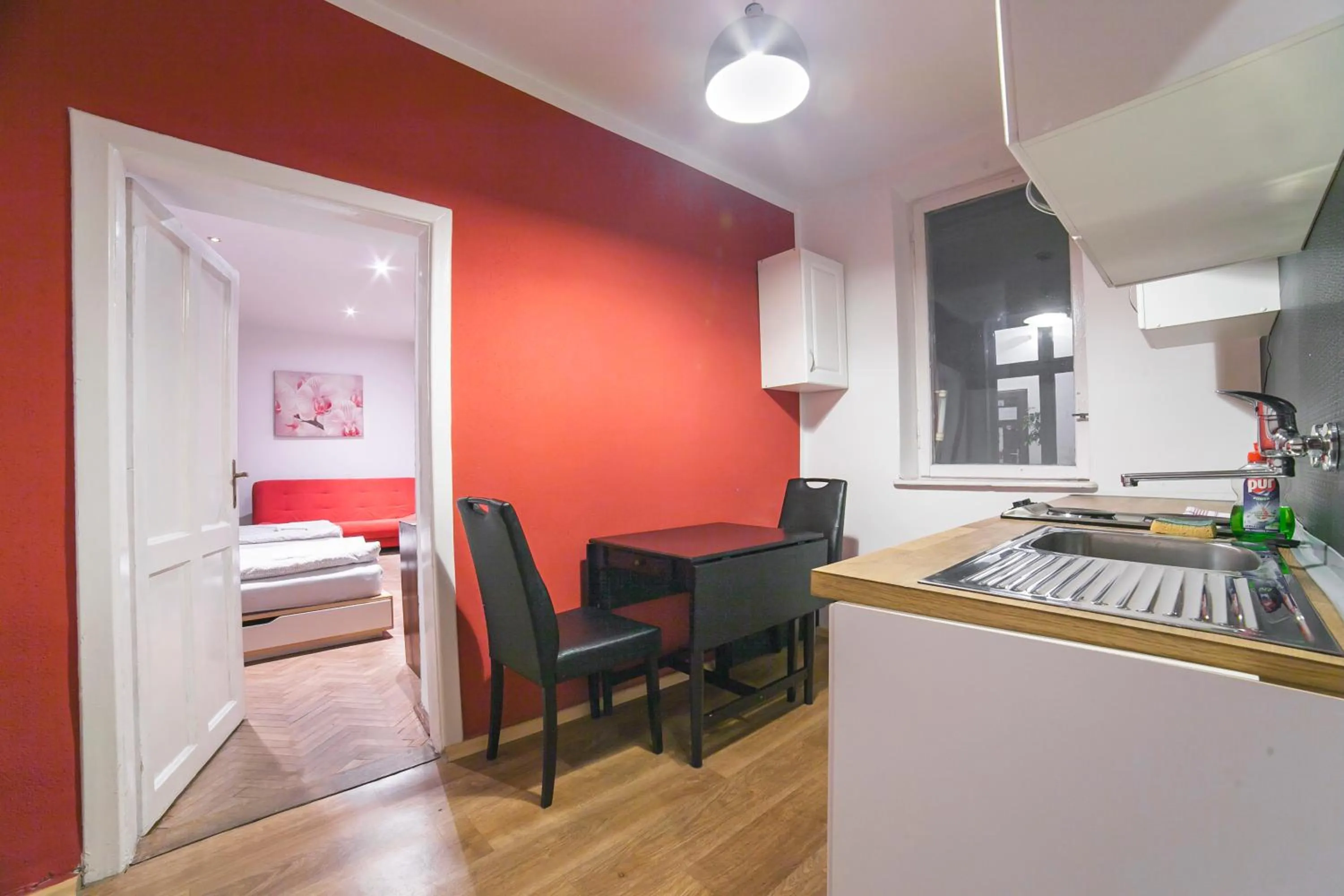 Kitchen or kitchenette, Bed in Residence B&B La Fontaine Aparthotel