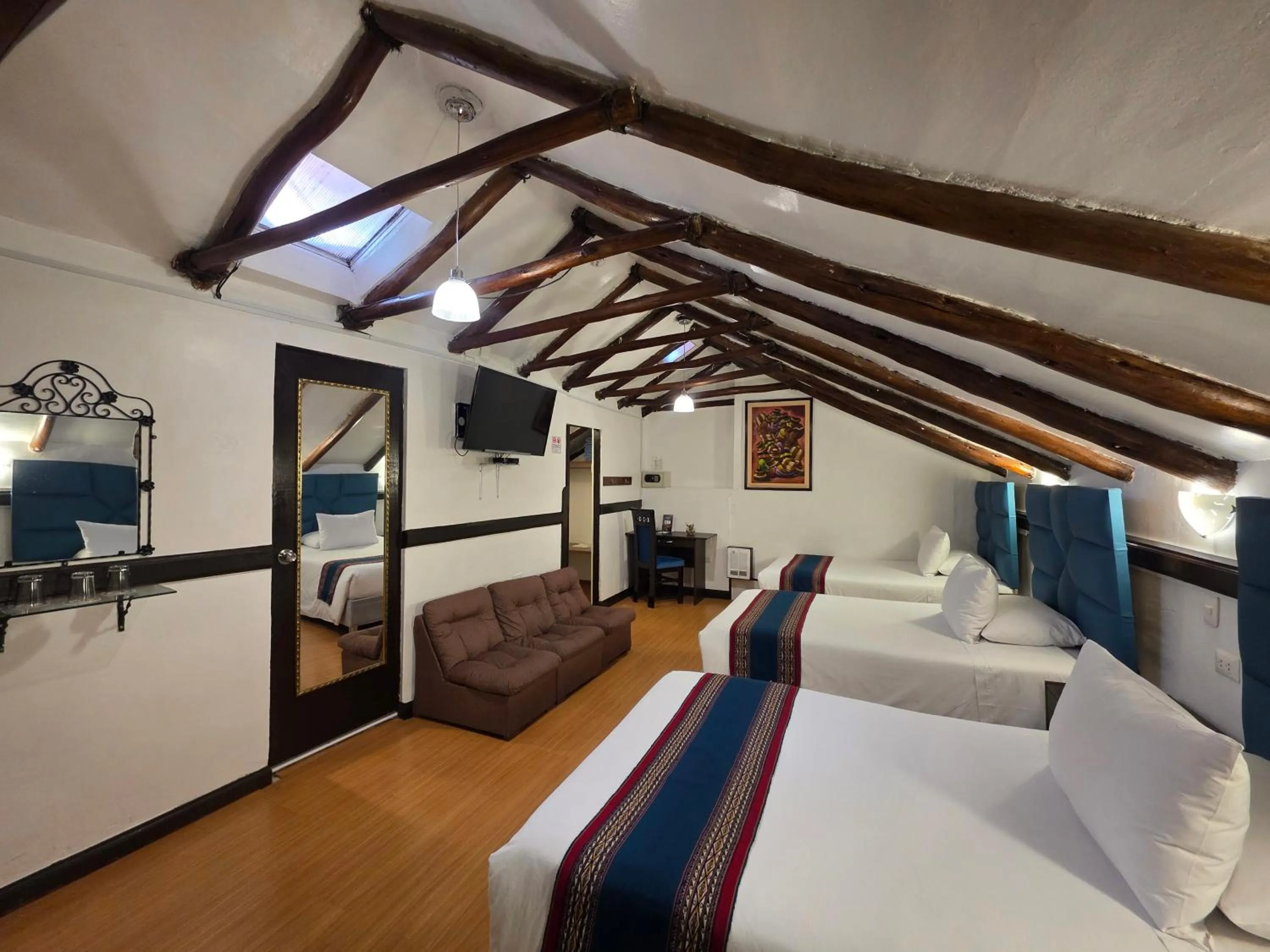 Bed in Hotel Hacienda Cusco Plaza