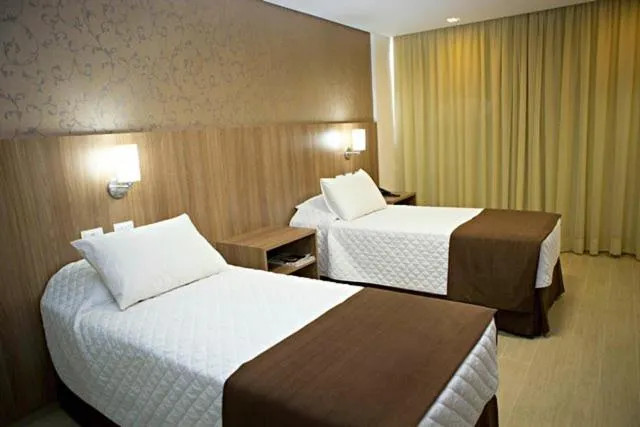 Bed in Foz Presidente Comfort Hotel