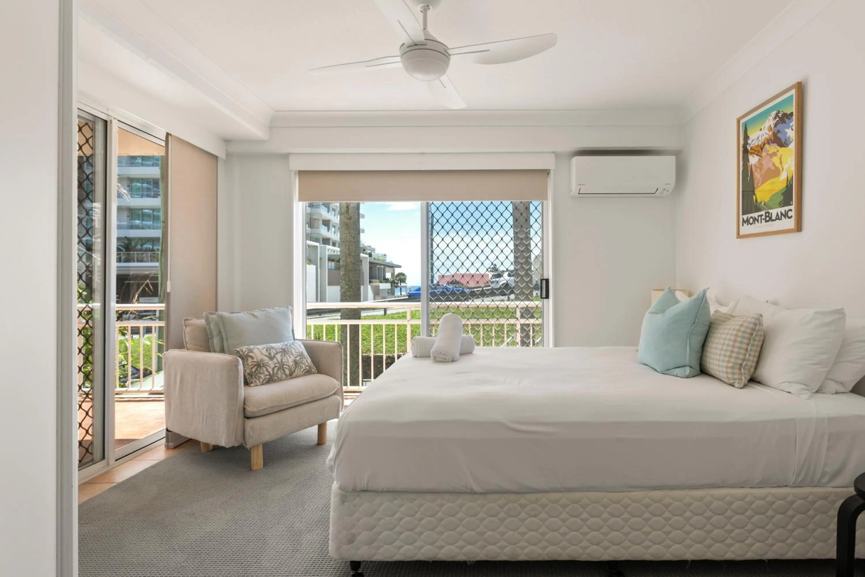 Bed in Kirra Palms Holiday Apartments