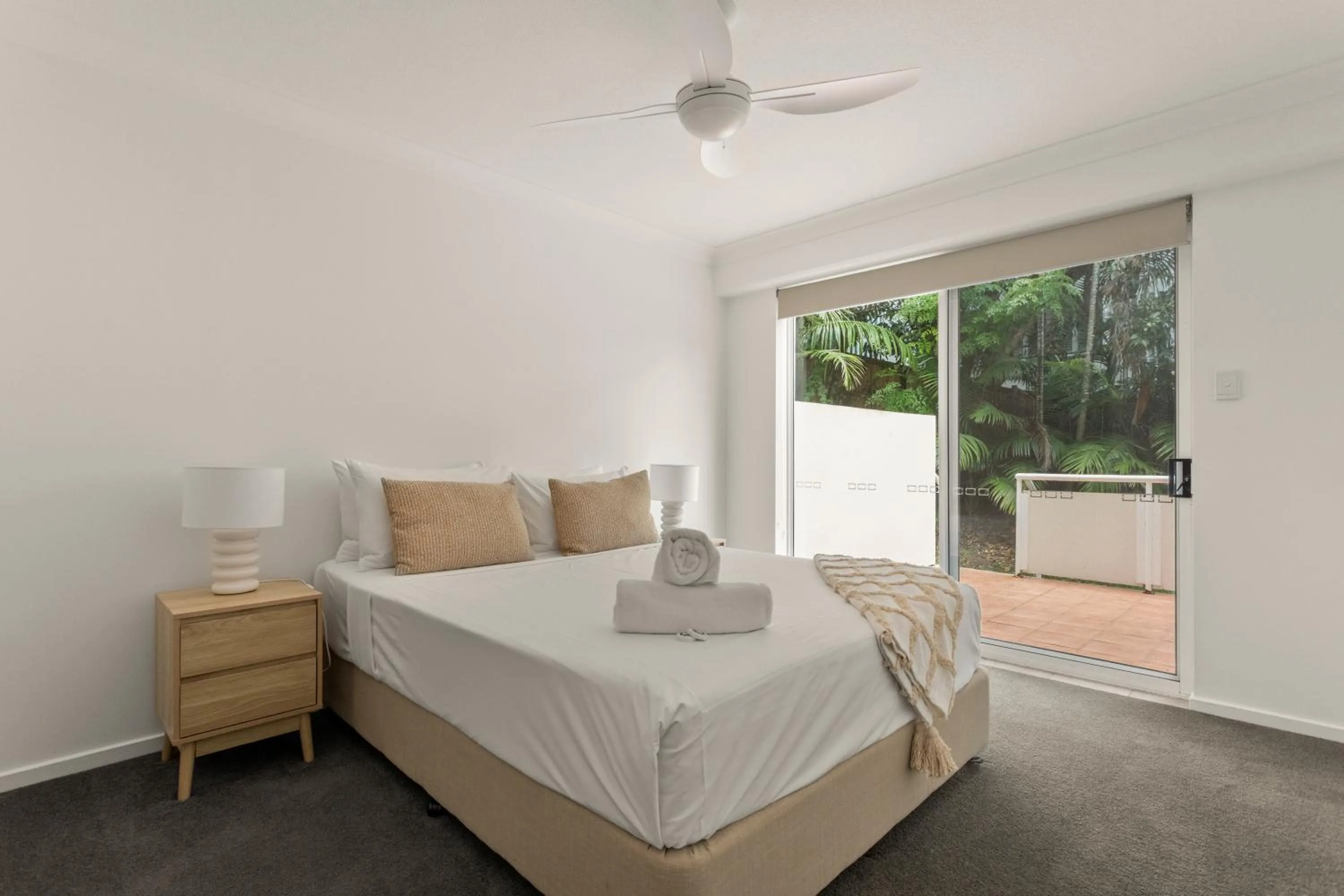 Bed in Kirra Palms Holiday Apartments