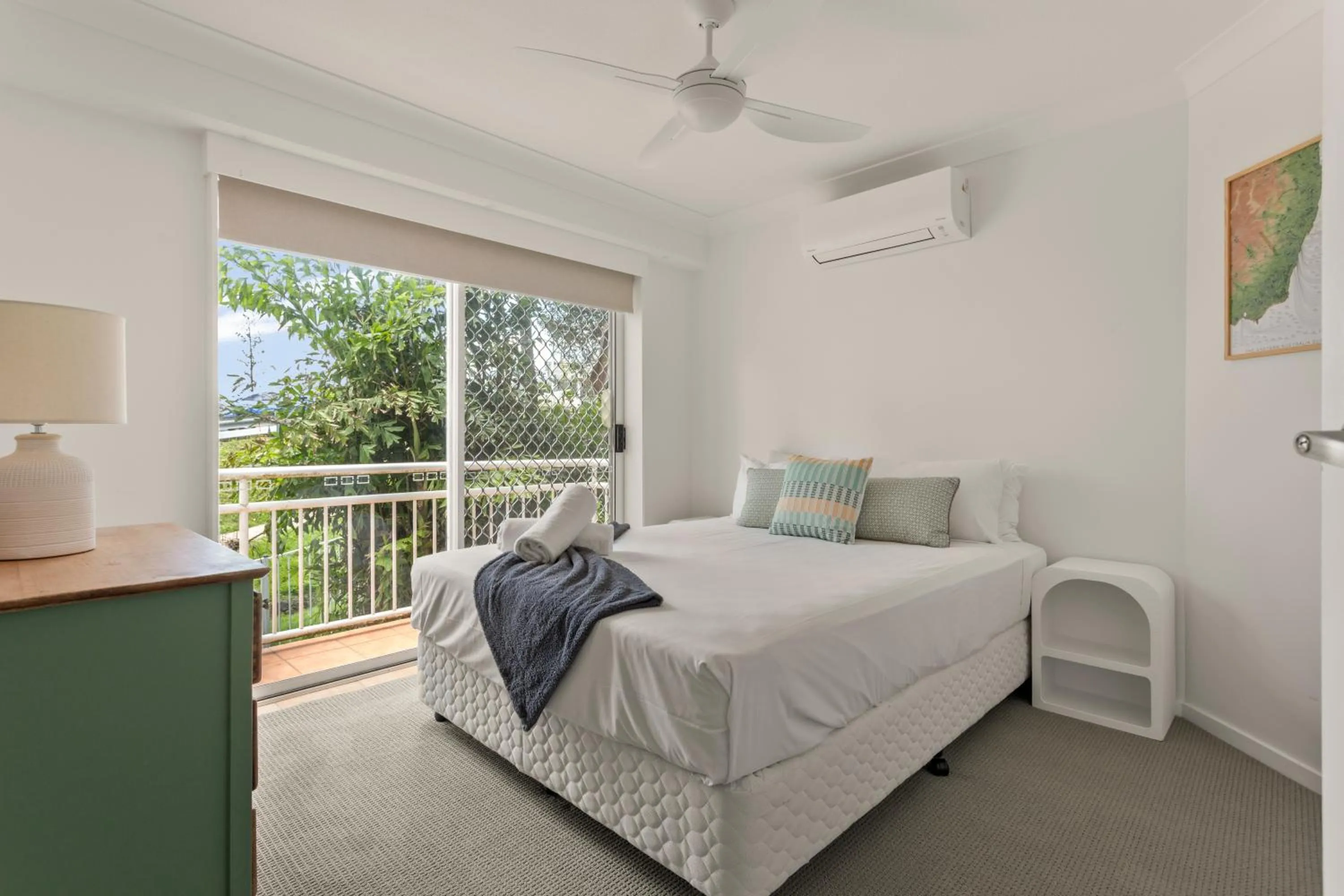 Bed in Kirra Palms Holiday Apartments