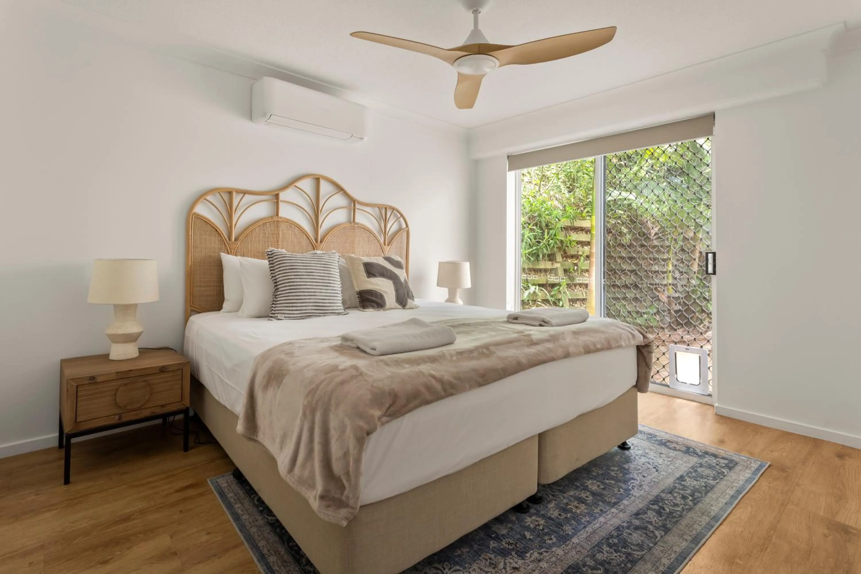 Bed in Kirra Palms Holiday Apartments