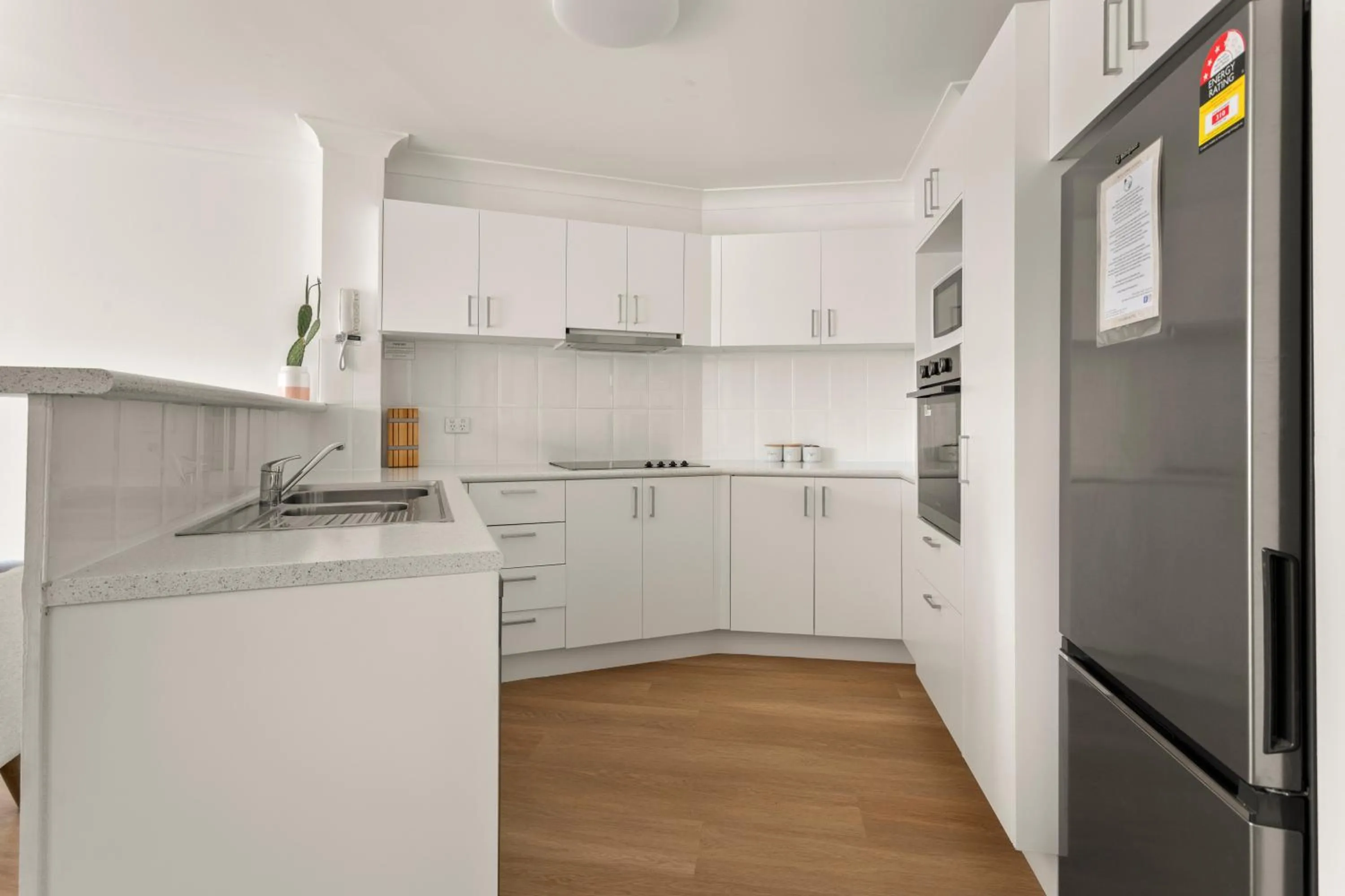 Kitchen or kitchenette in Kirra Palms Holiday Apartments