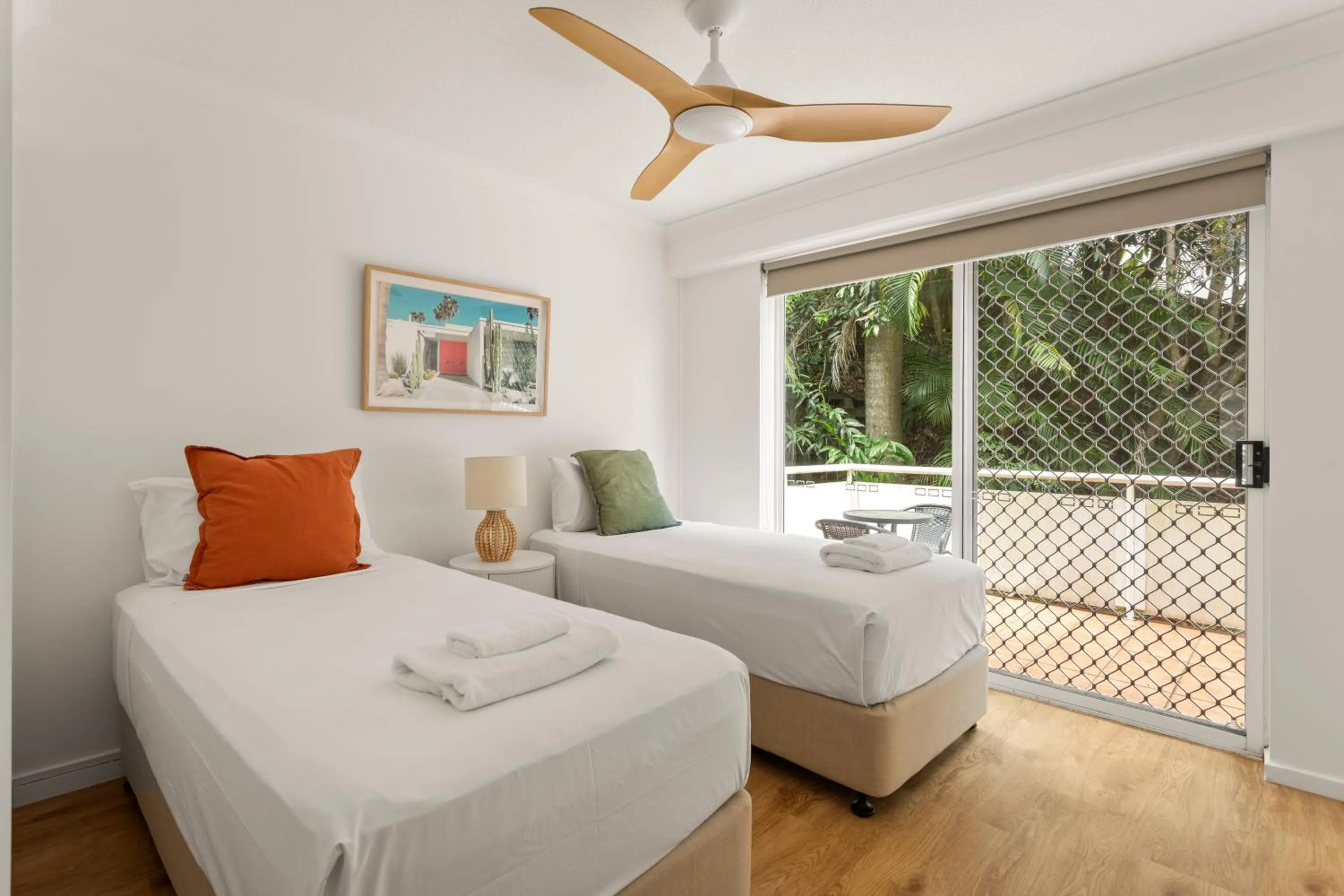 Bed in Kirra Palms Holiday Apartments