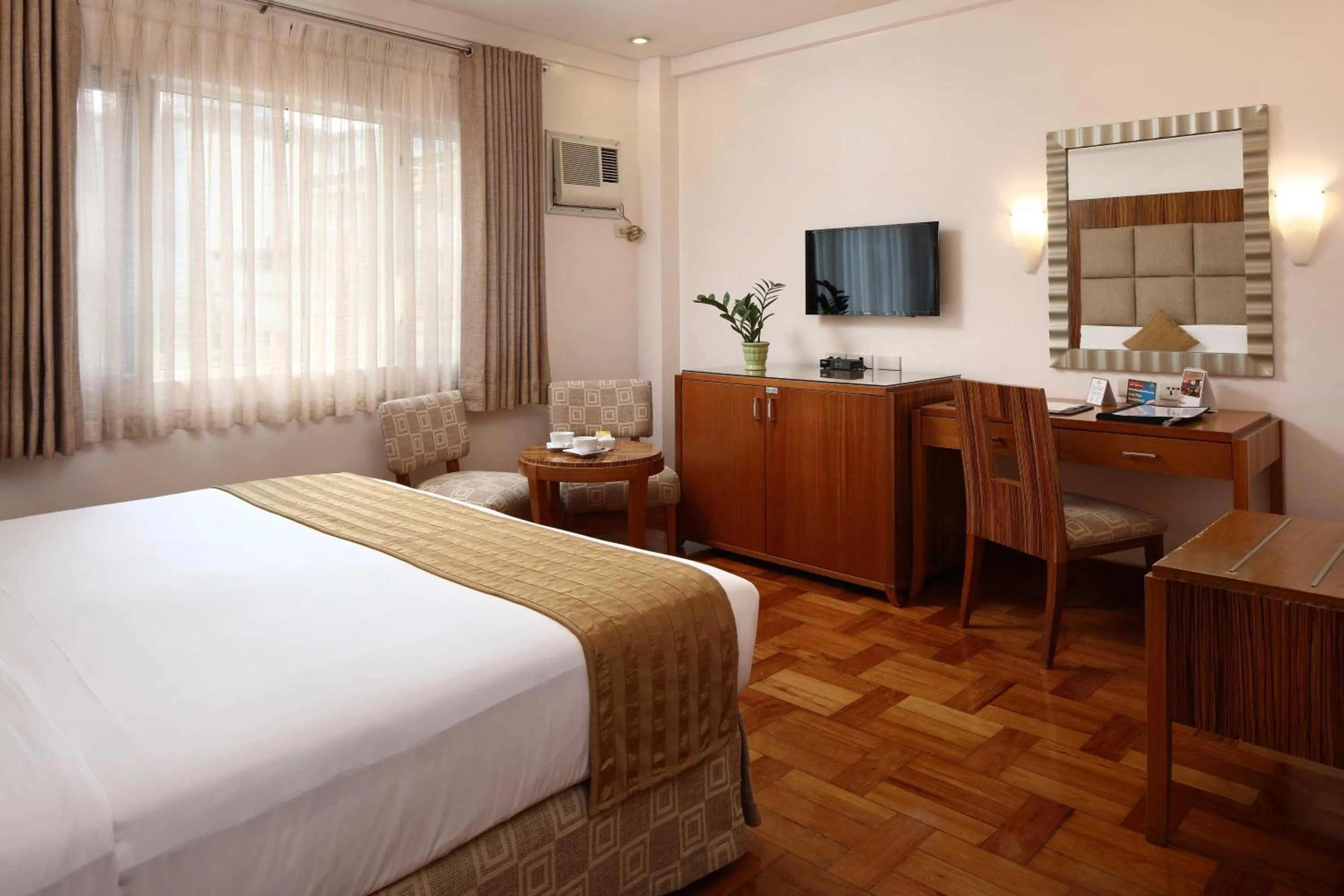 Bed in City Garden Suites Manila