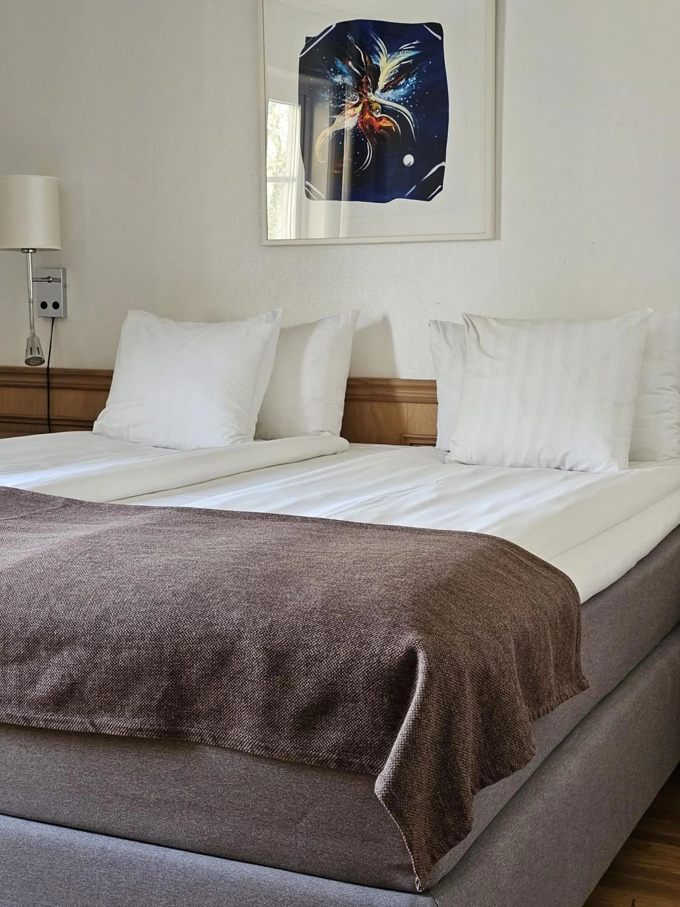 Bed in Hotel Skansen