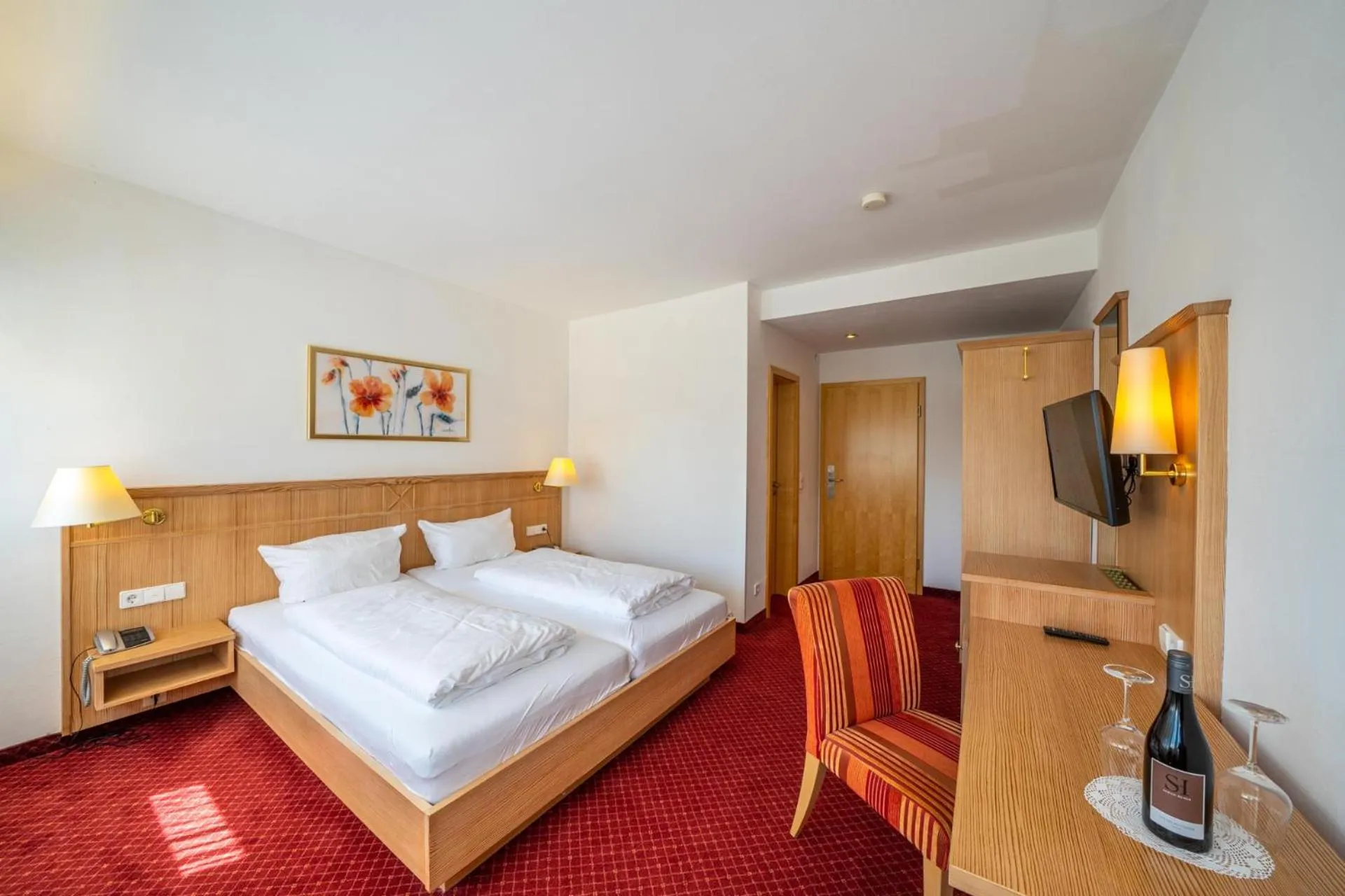 Photo of the whole room, Bed in Weinhotel Pfeffer & Salz