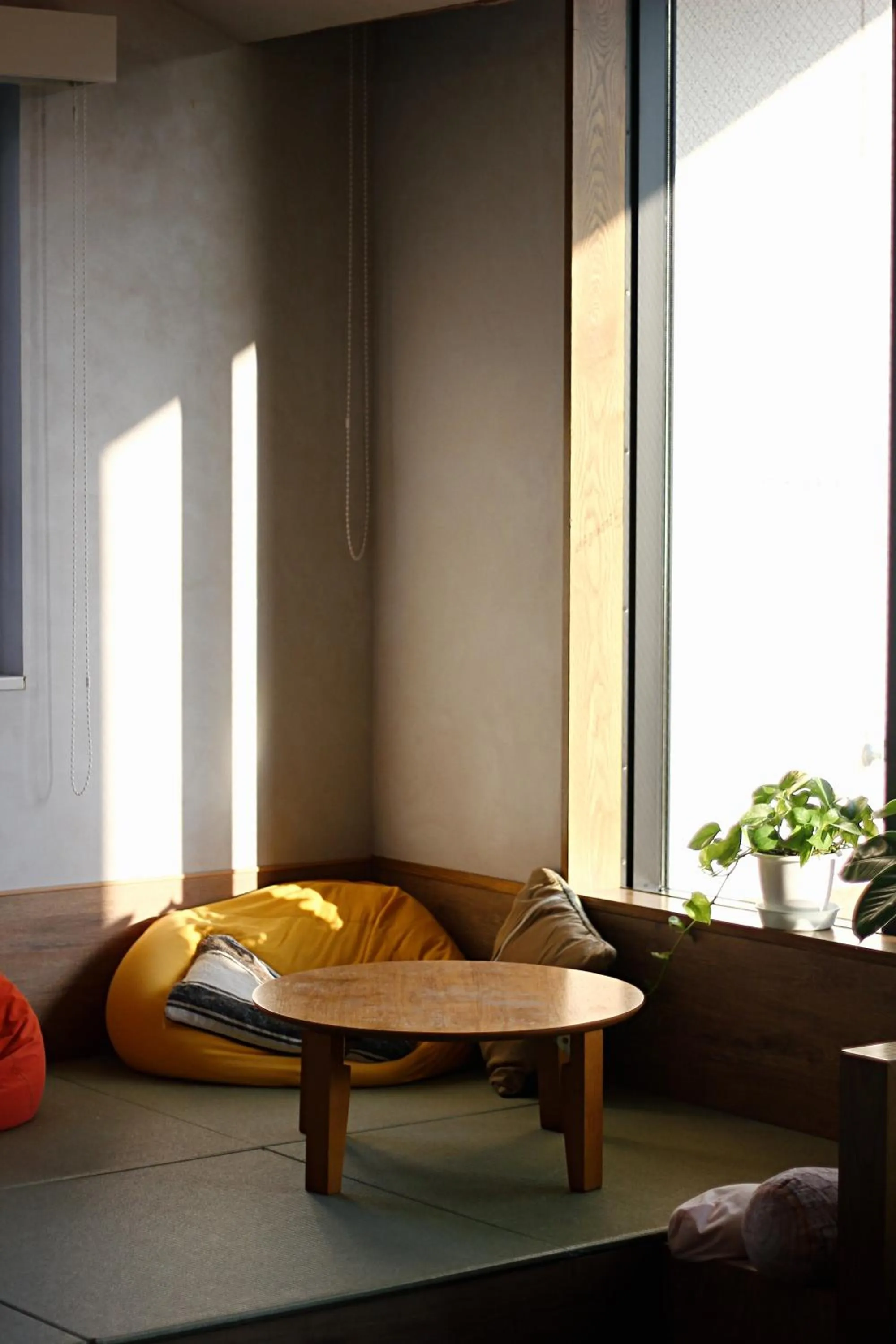 Communal lounge/ TV room, Bed in WeBase Hakata Hostel