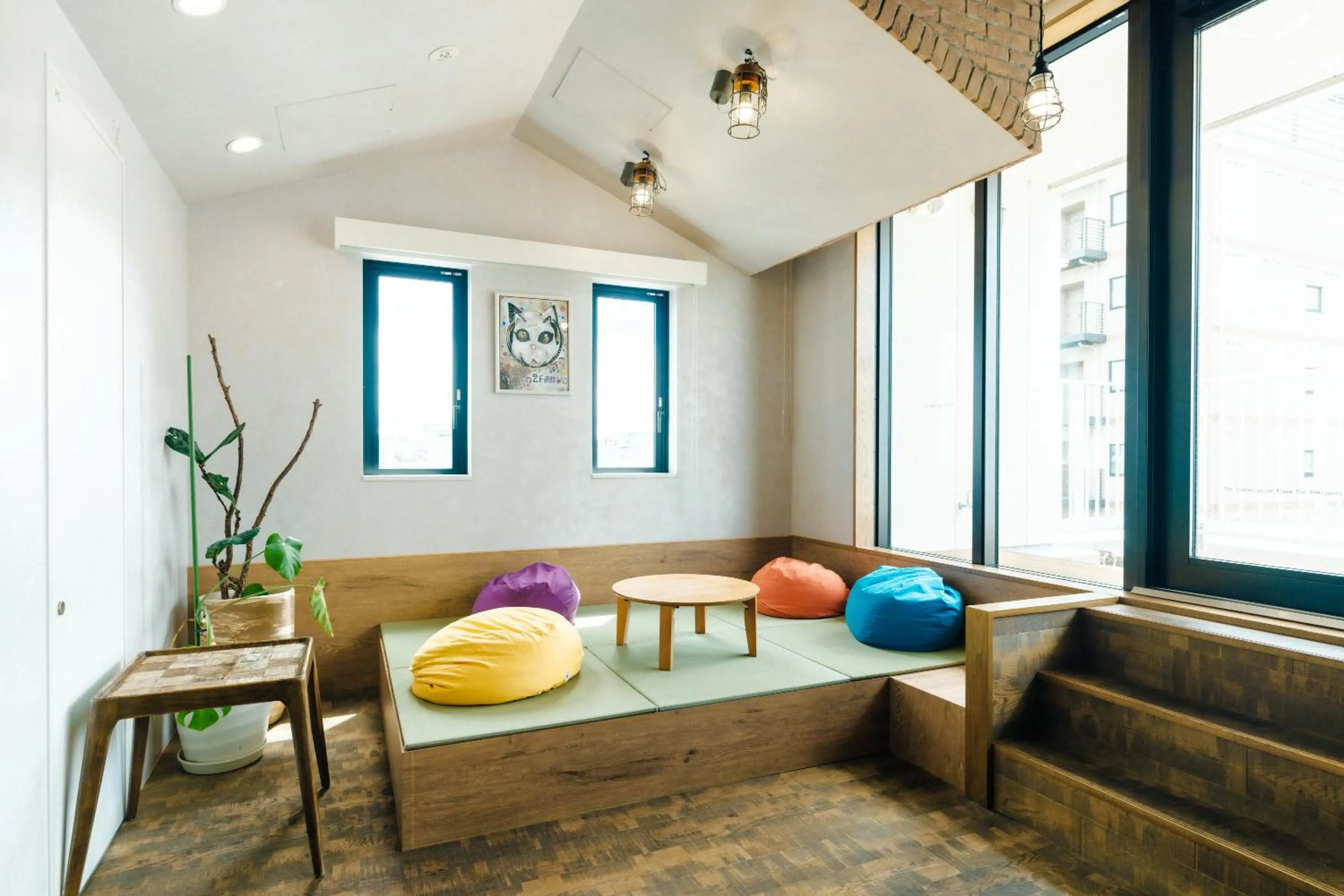 Communal lounge/ TV room in WeBase Hakata Hostel