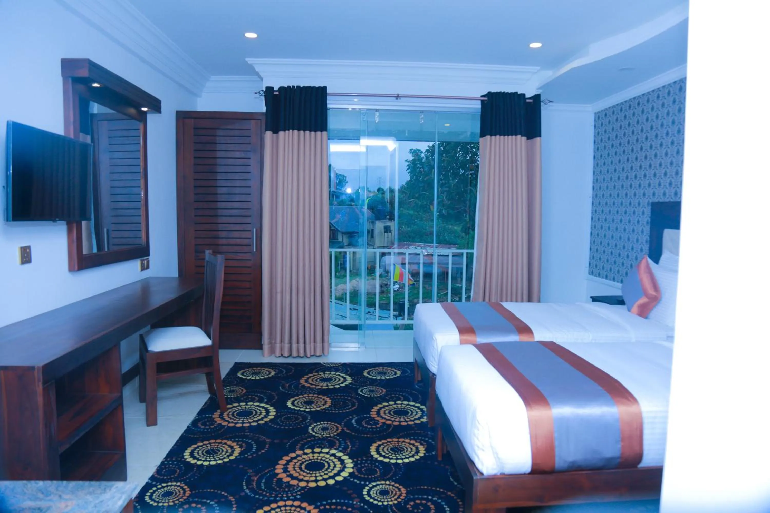 Photo of the whole room, Bed in Galaxy Grand Hotel