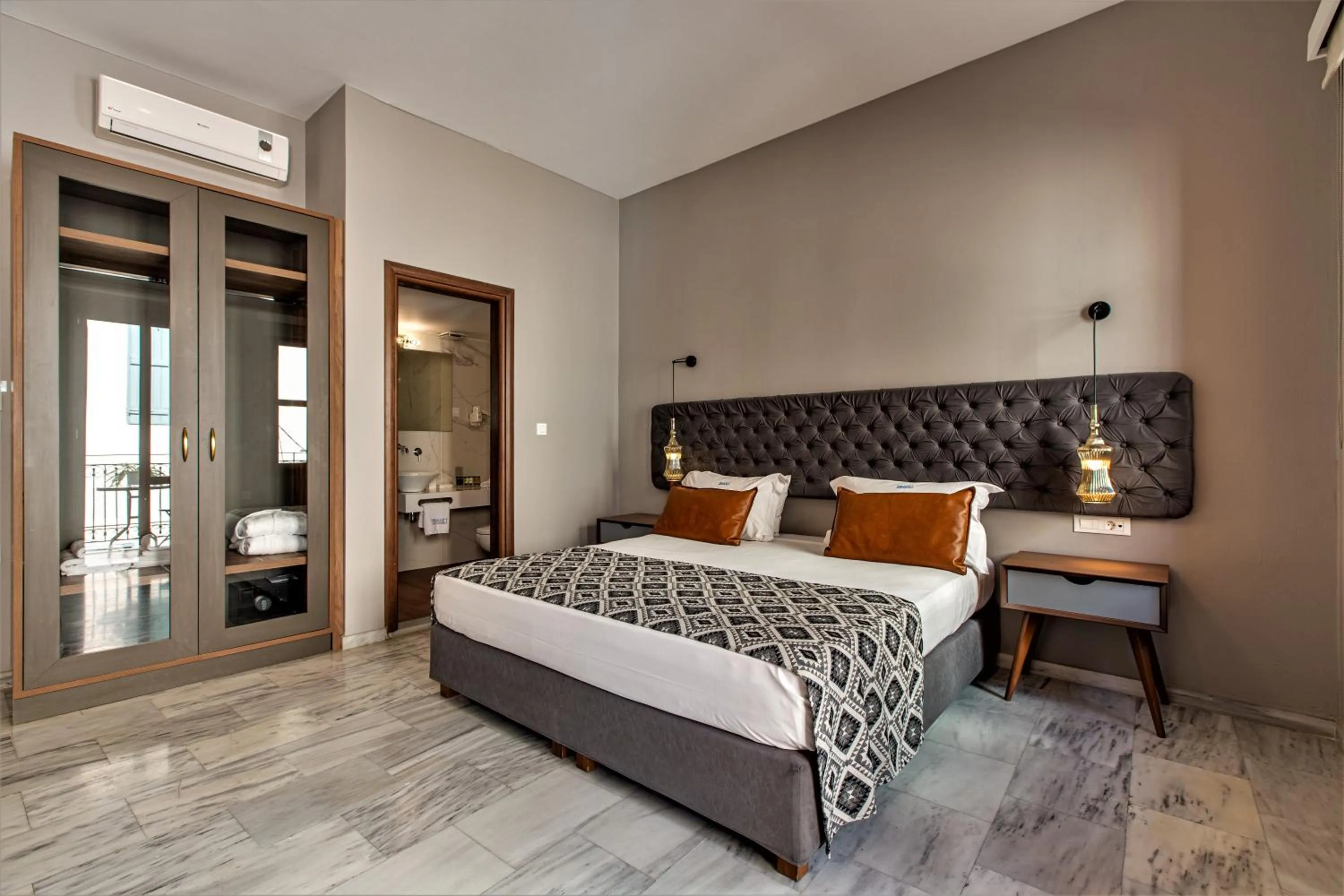 Bed in Minaret Suites and Apartments