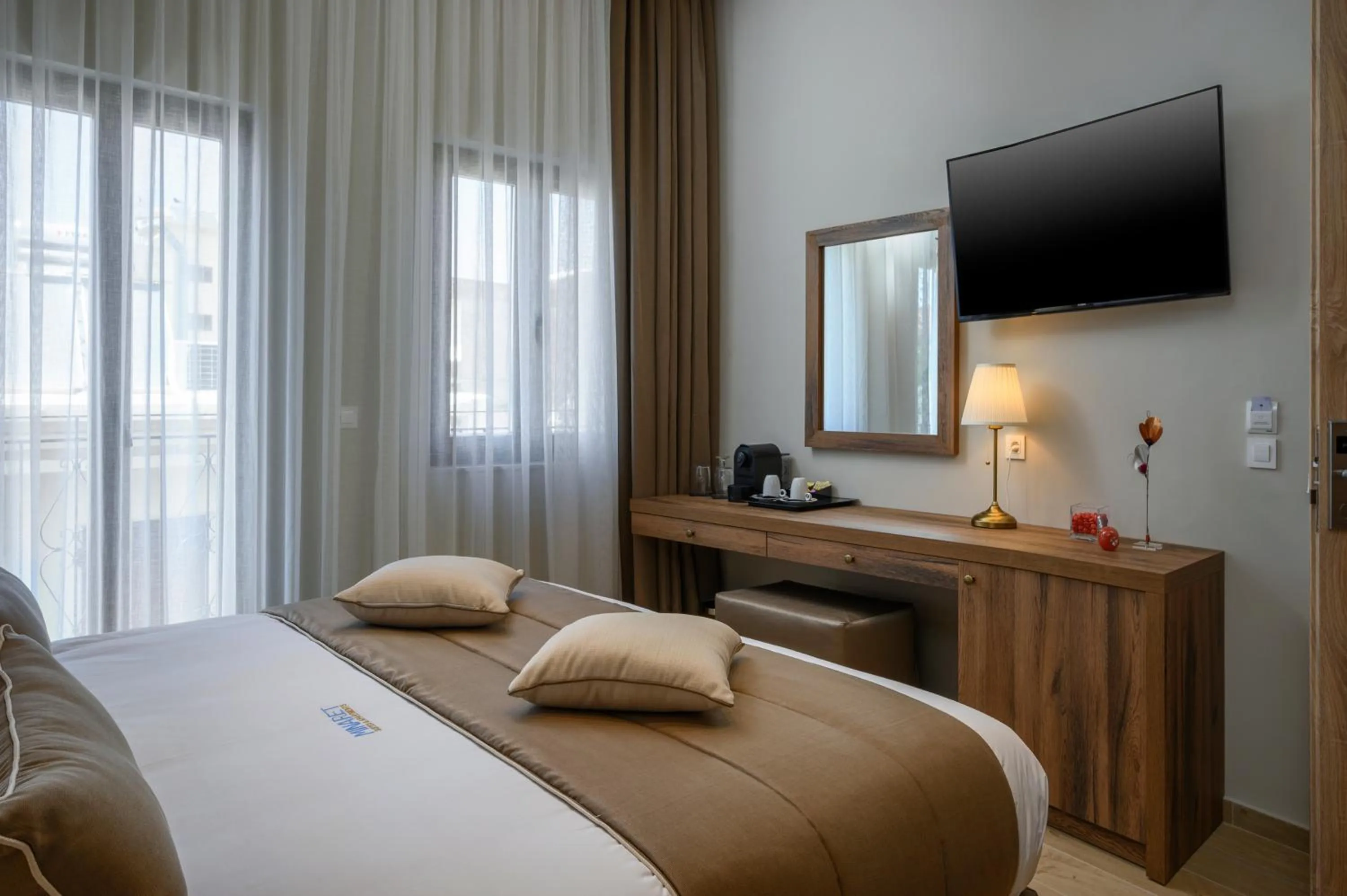 Bed in Minaret Suites and Apartments