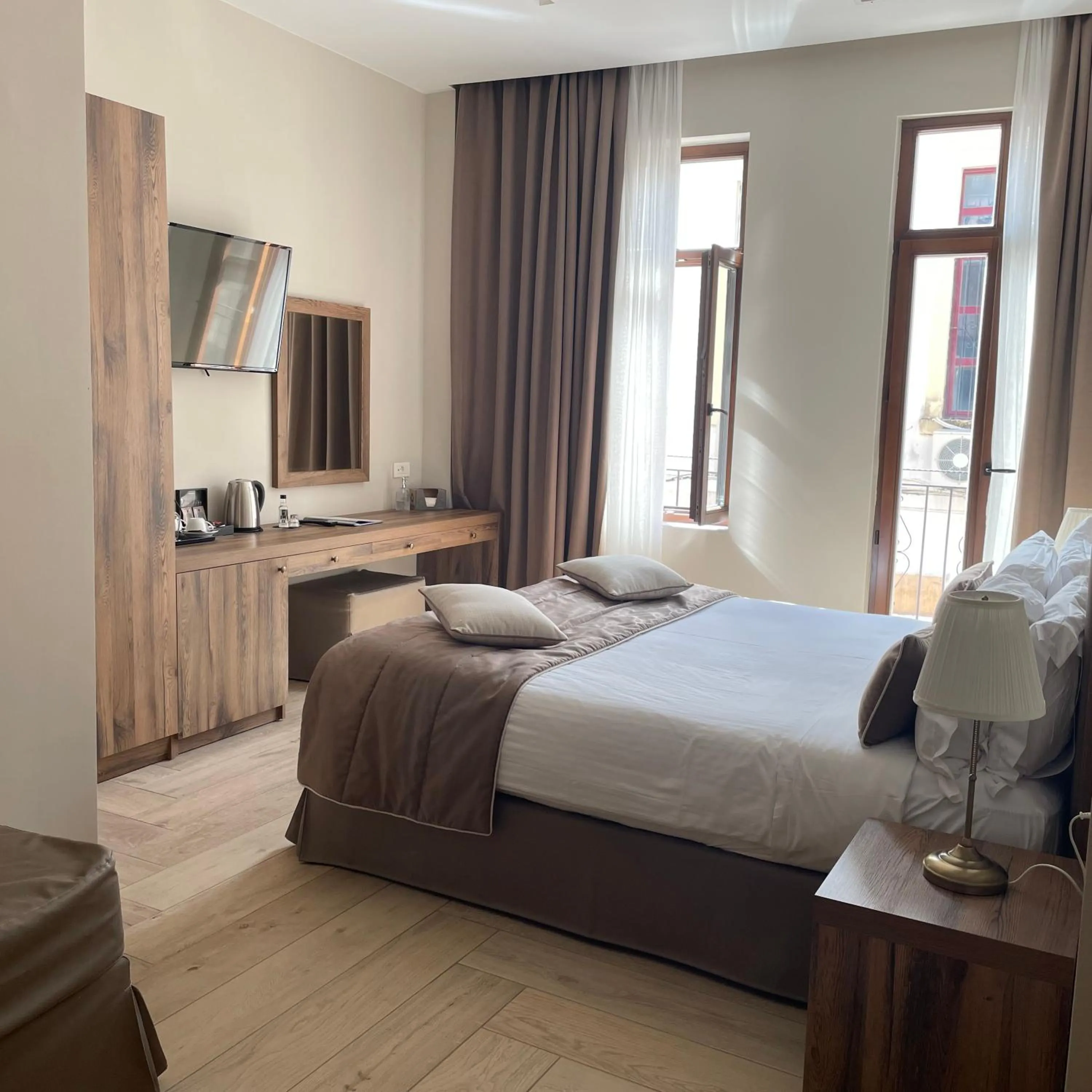 Bed in Minaret Suites and Apartments