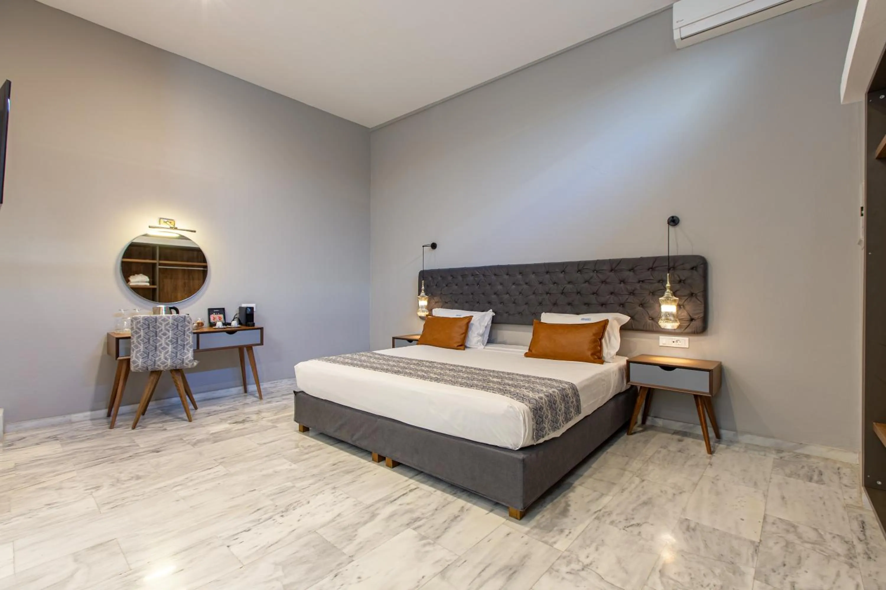 Bed in Minaret Suites and Apartments