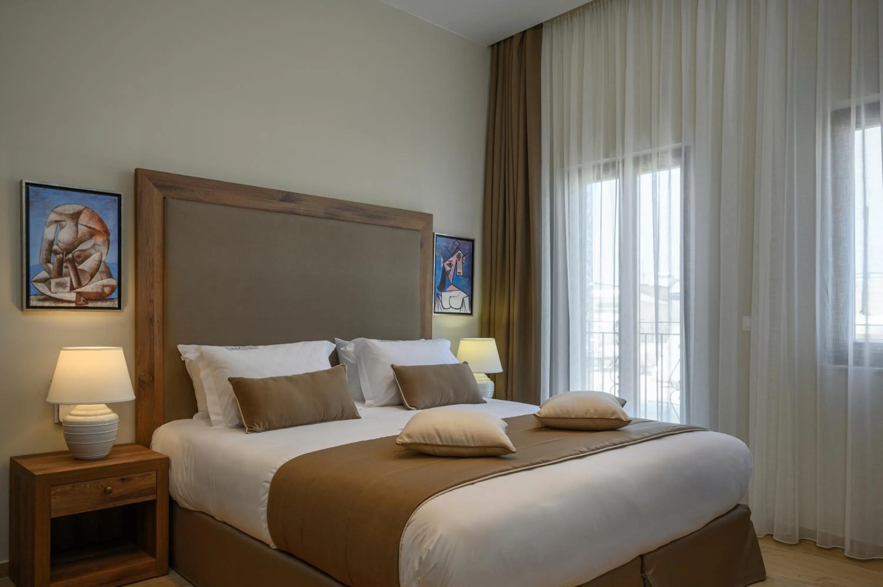 Bed in Minaret Suites and Apartments