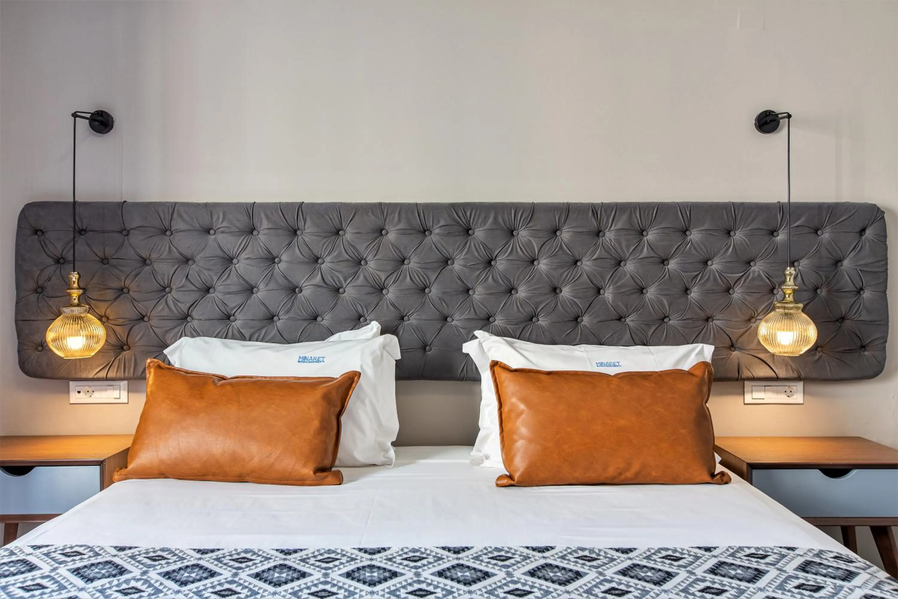 Bed in Minaret Suites and Apartments