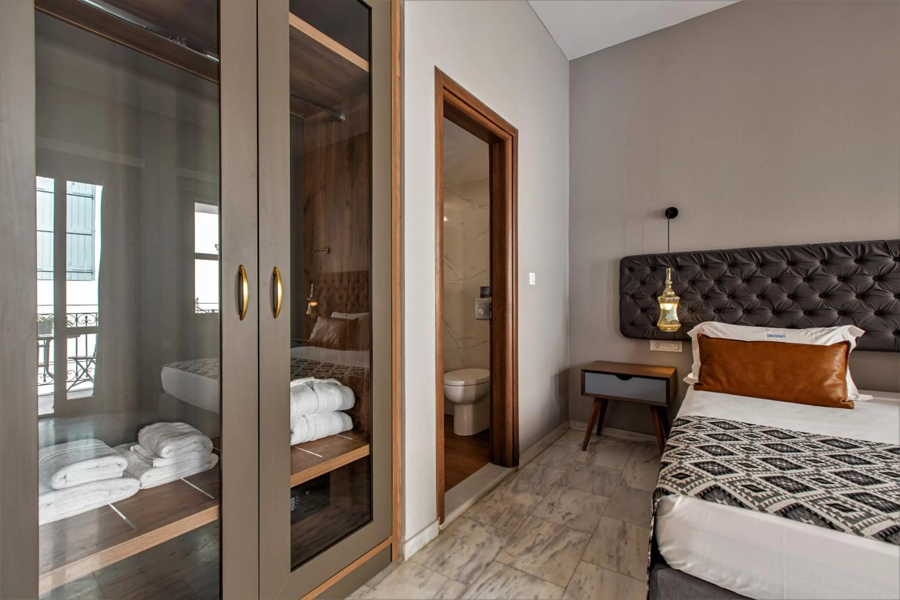 Bed in Minaret Suites and Apartments