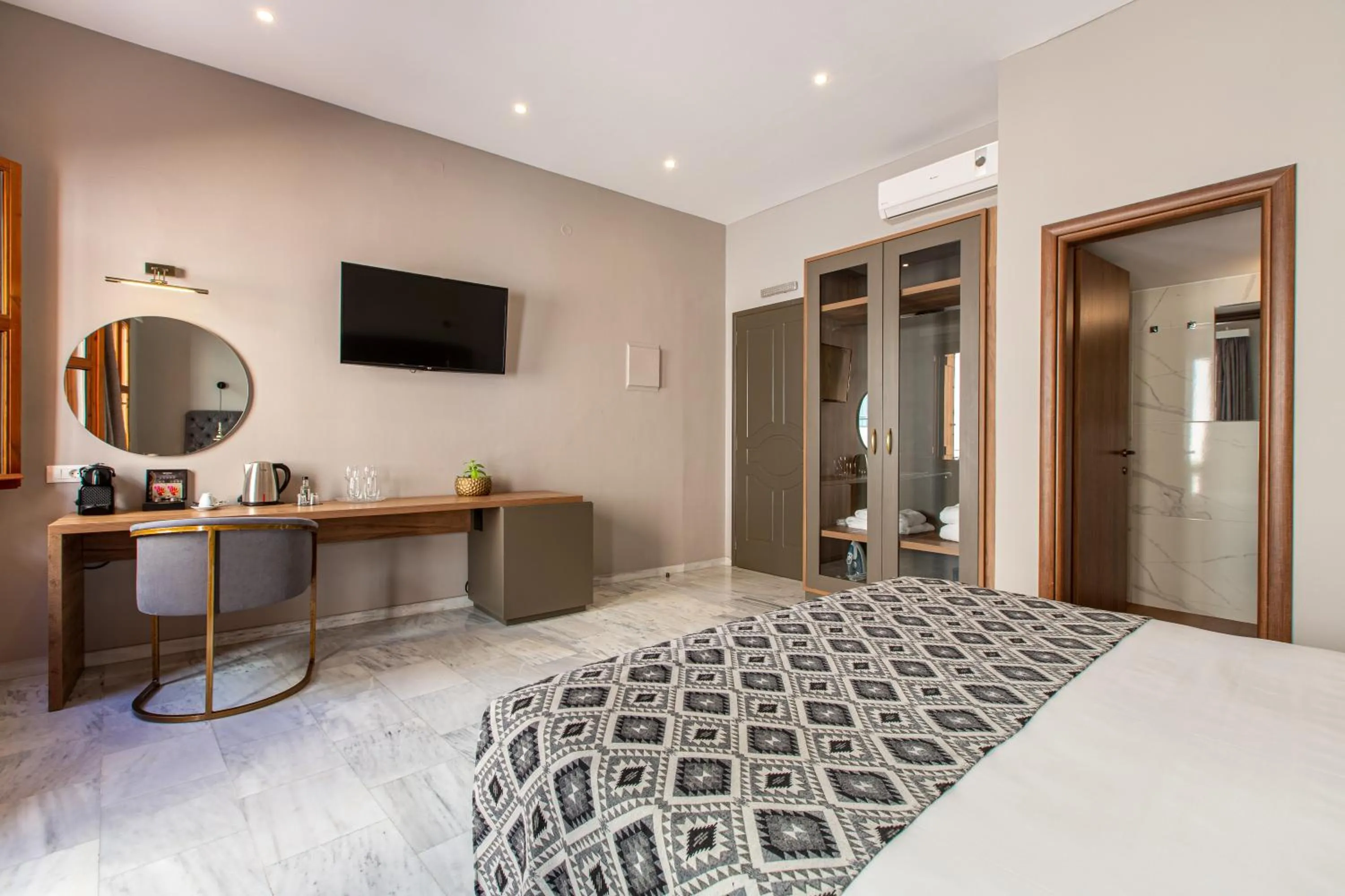 Bed in Minaret Suites and Apartments