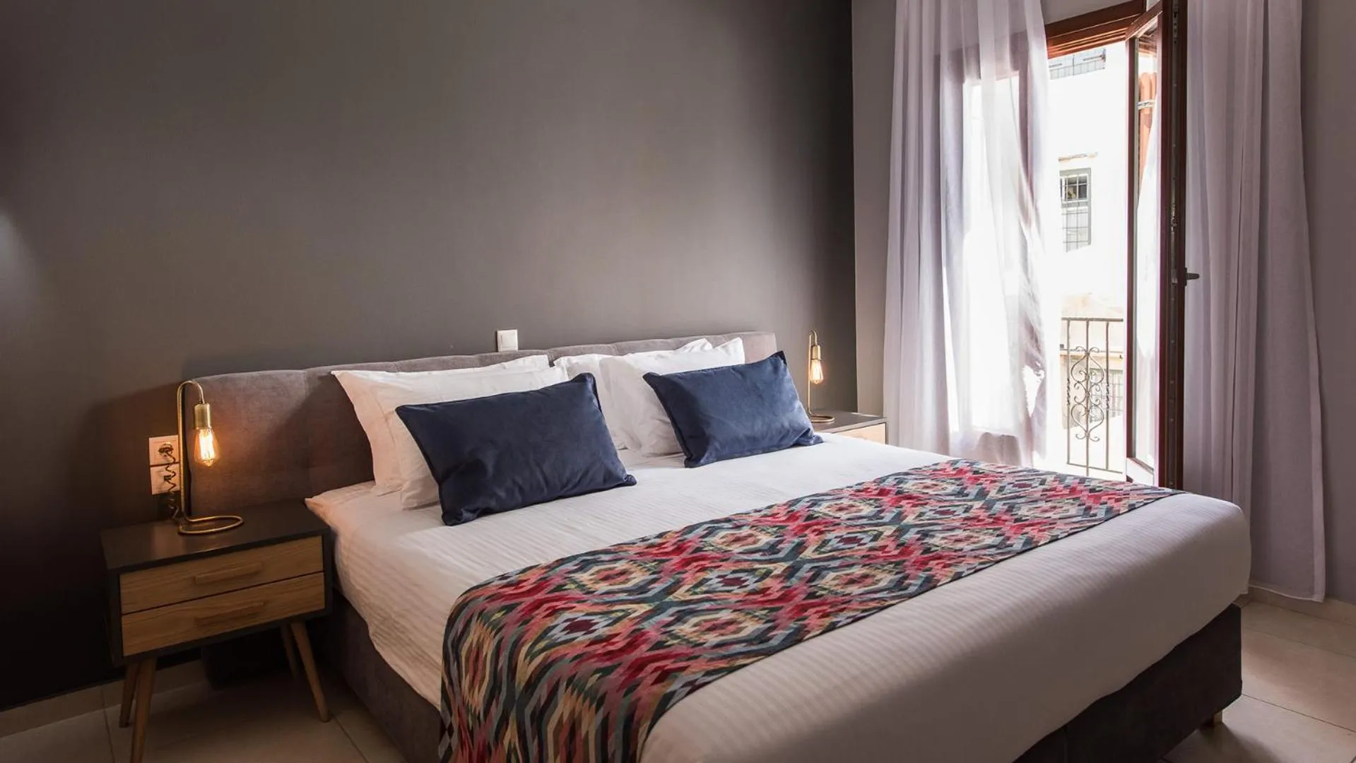 Bed in Minaret Suites and Apartments