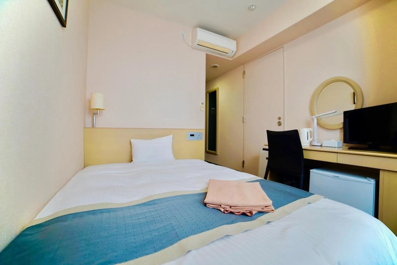 Bed in Hotel Frontier Iwaki