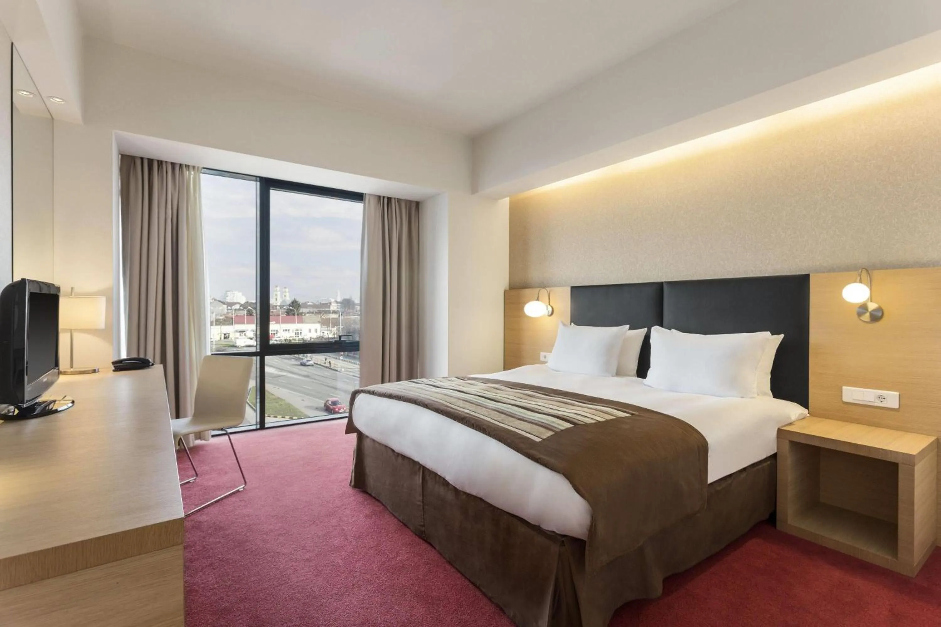 Photo of the whole room, Bed in Ramada by Wyndham Oradea