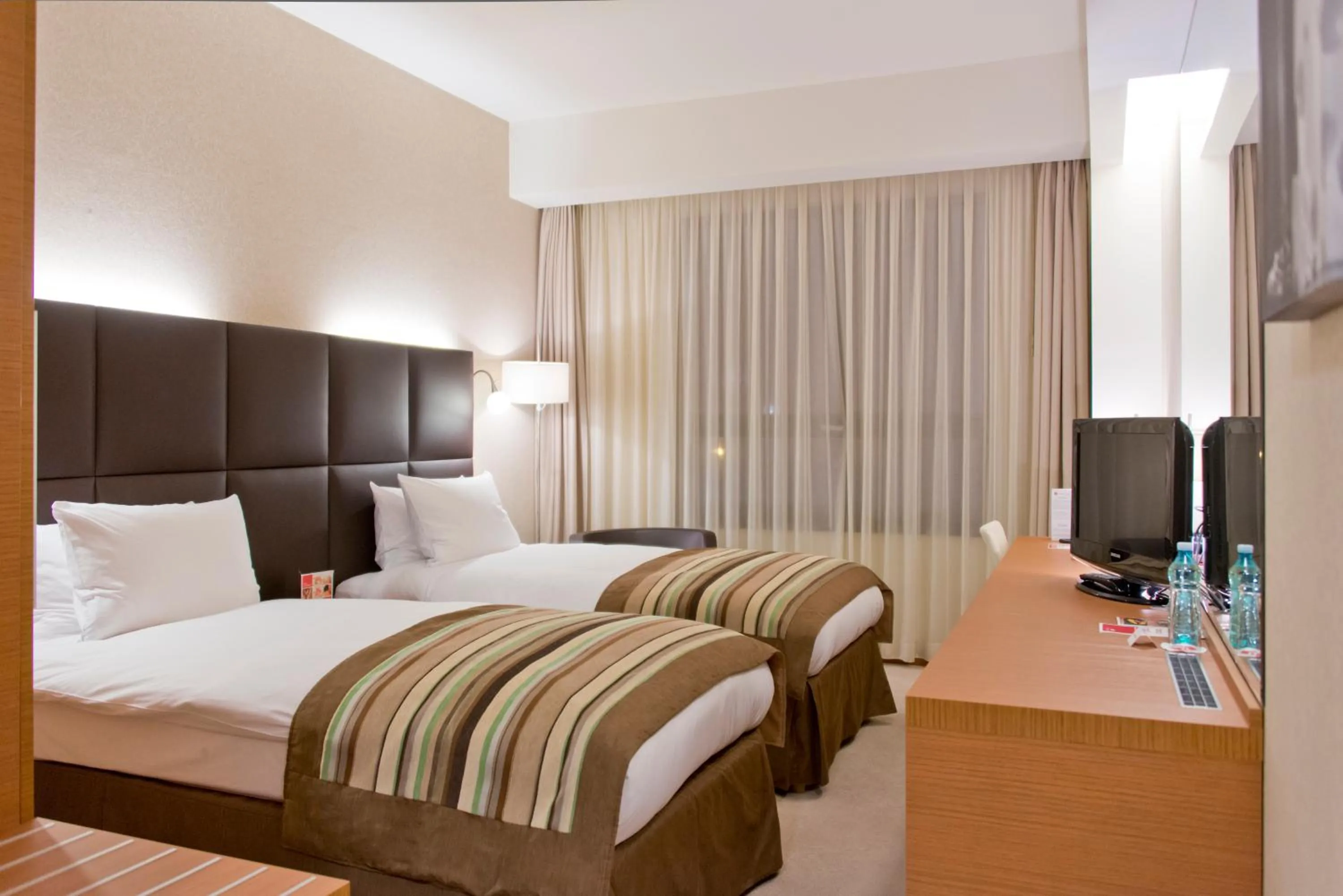 Bed in Ramada by Wyndham Oradea