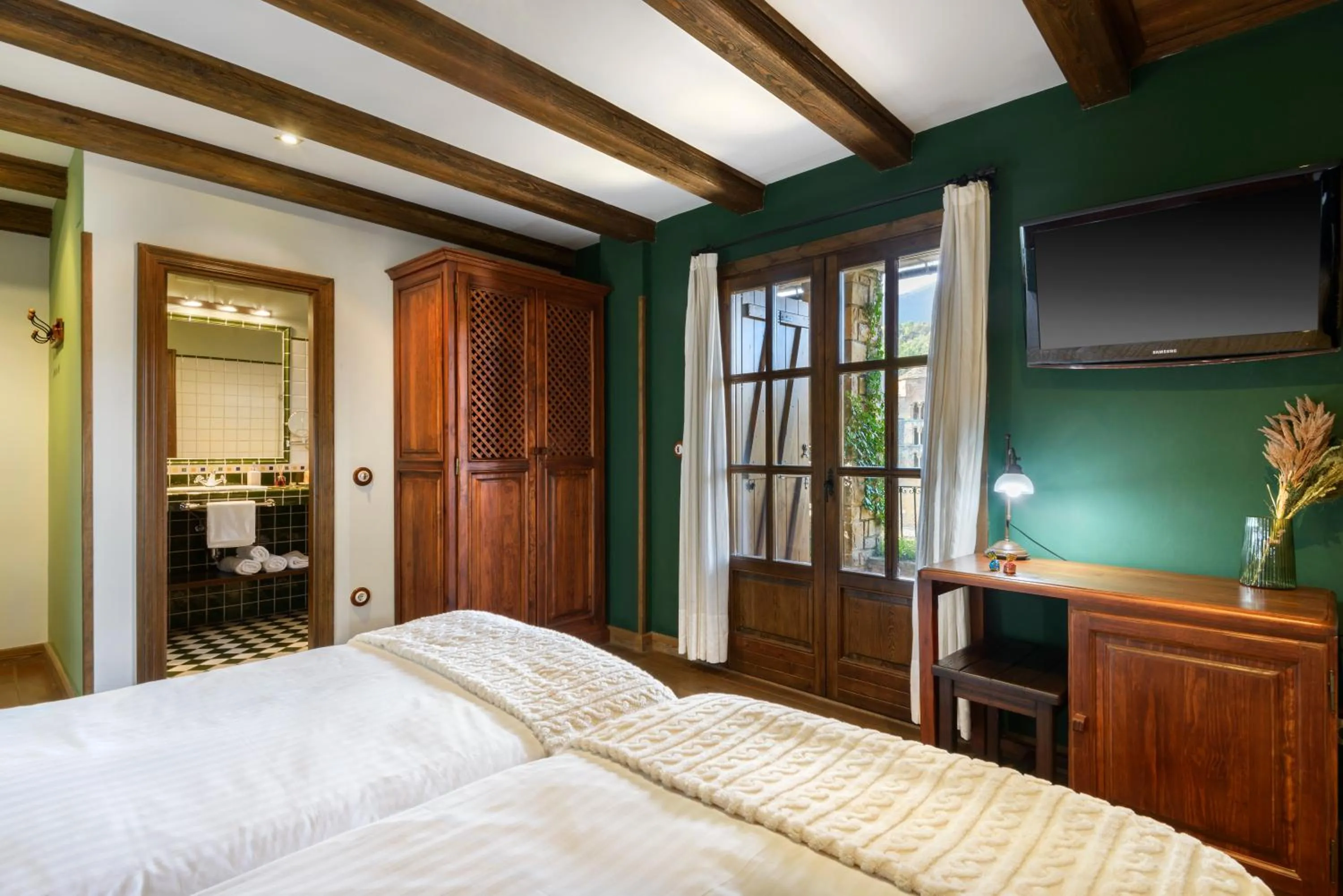 Photo of the whole room, Bed in Hotel Rural El Mirador de los Pirineos