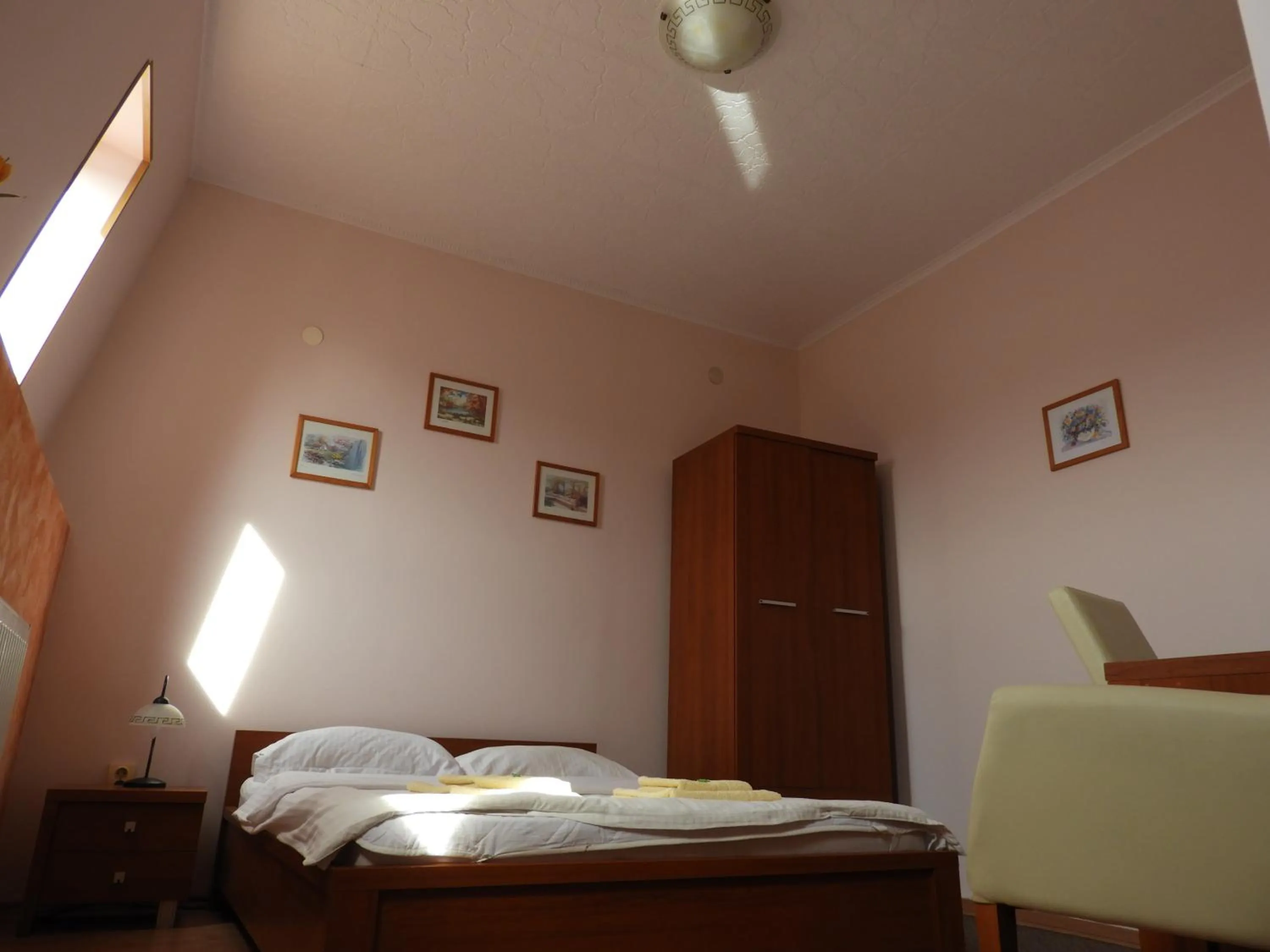 Bedroom in Pensiunea Caramell