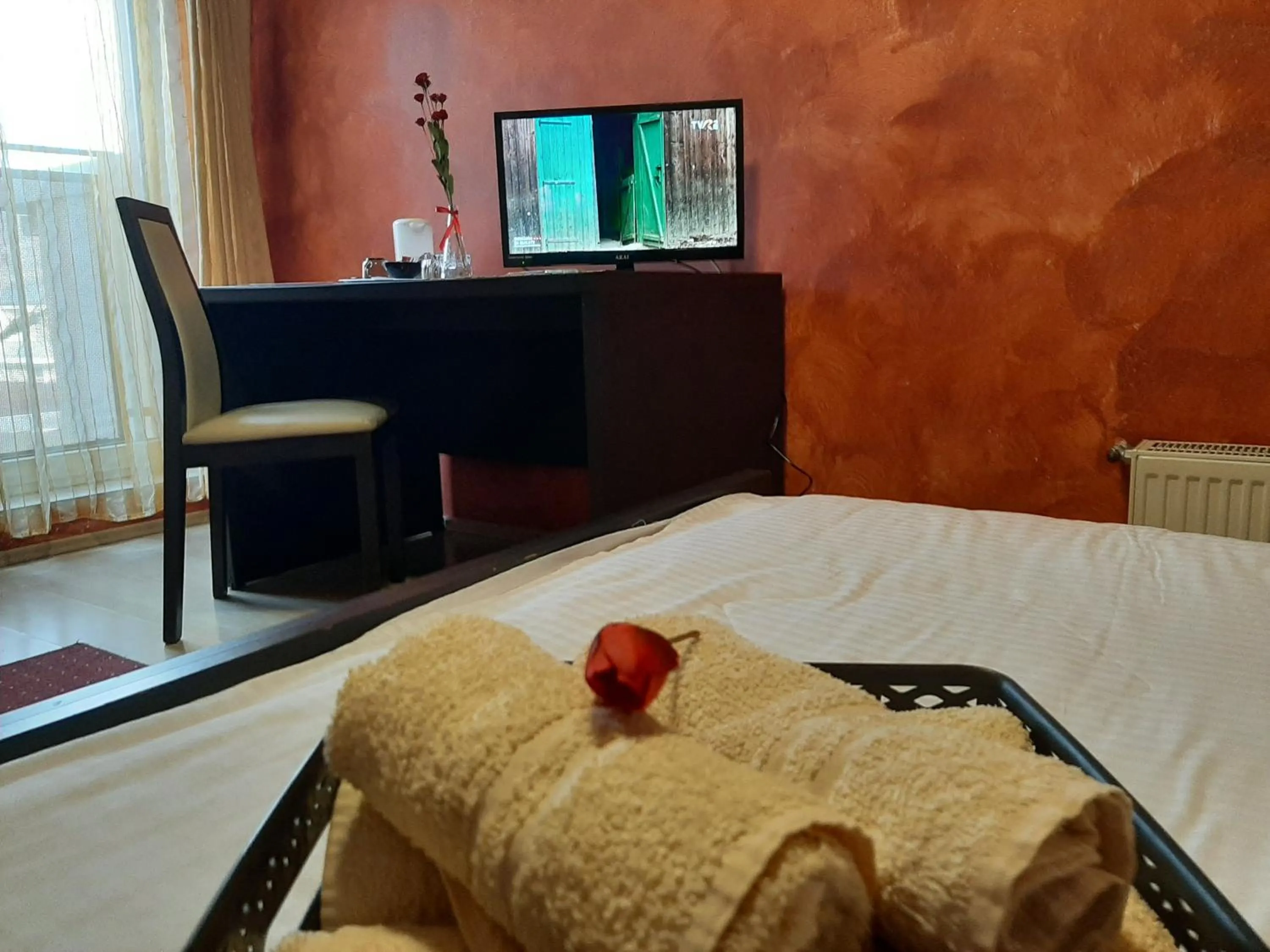 Bedroom in Pensiunea Caramell