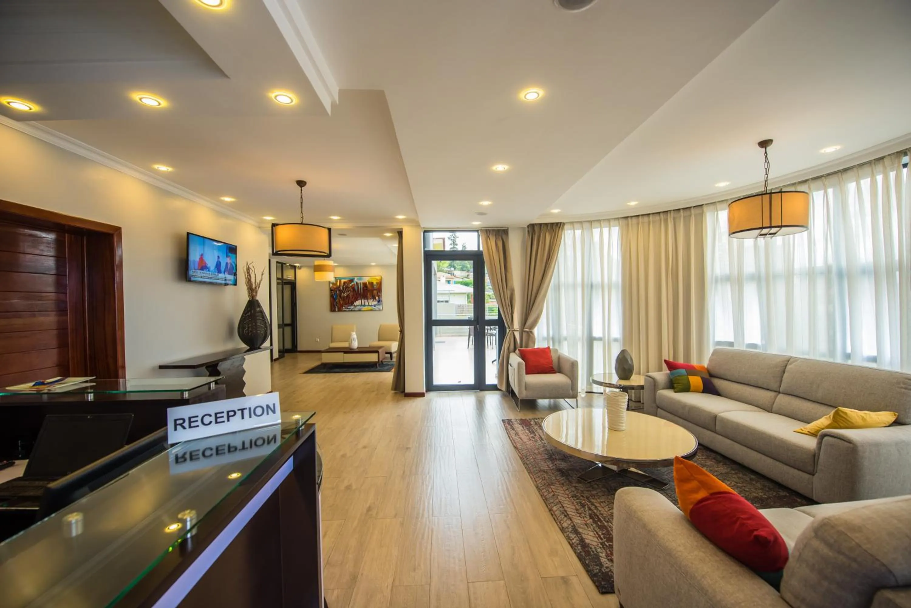 Communal lounge/ TV room in The Court Boutique Hotel