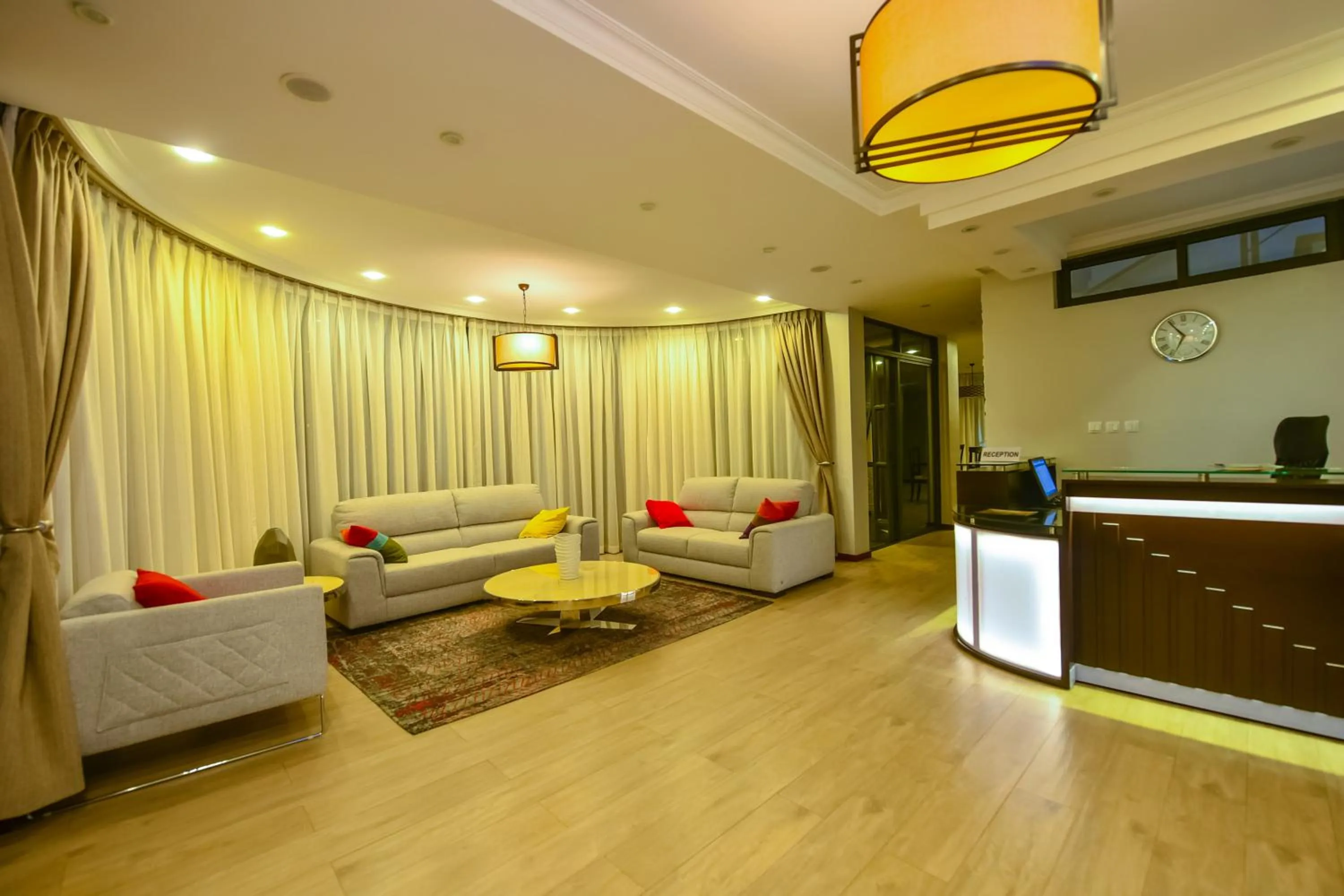 Communal lounge/ TV room in The Court Boutique Hotel