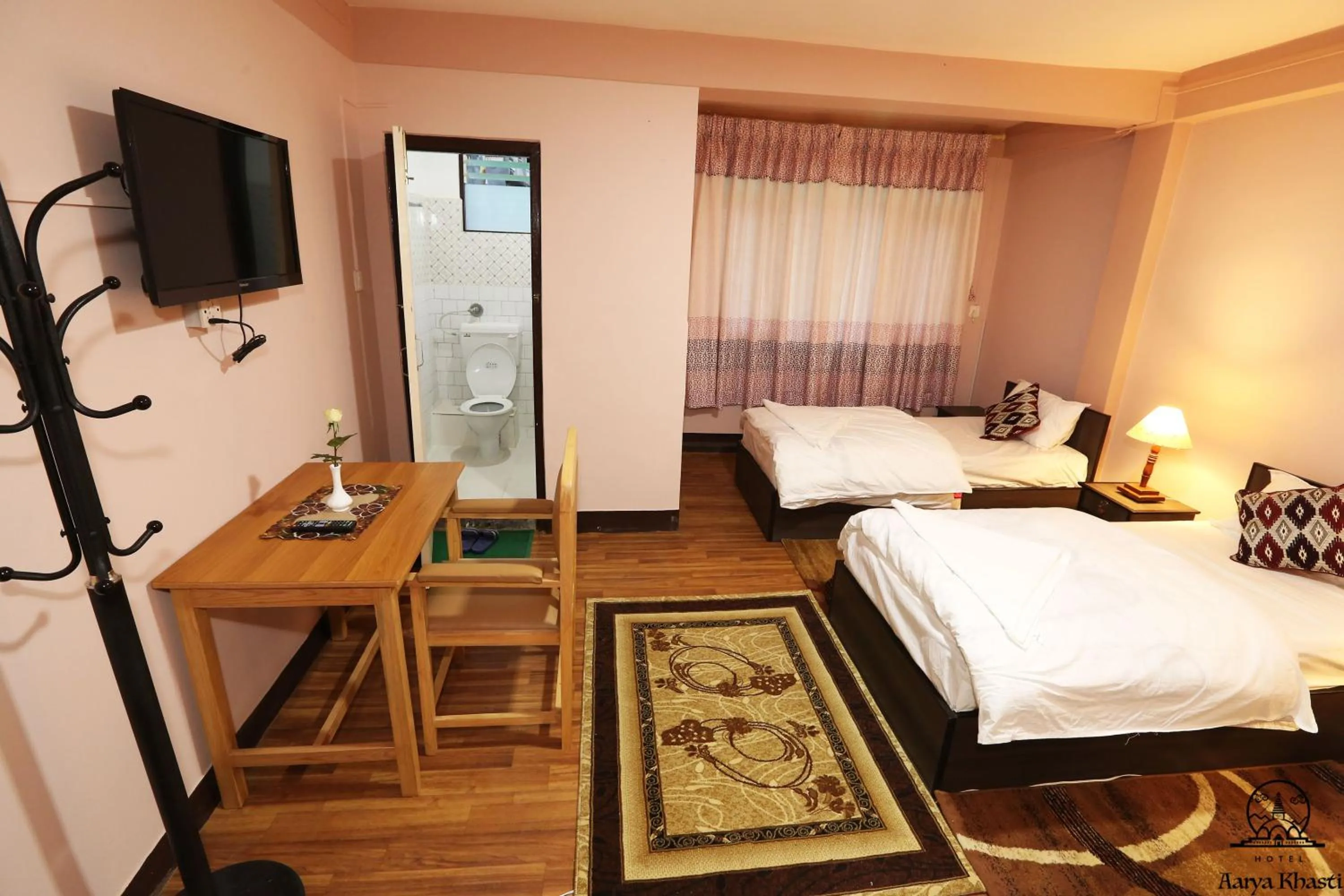 TV and multimedia, Bed in Aarya Chaitya Inn