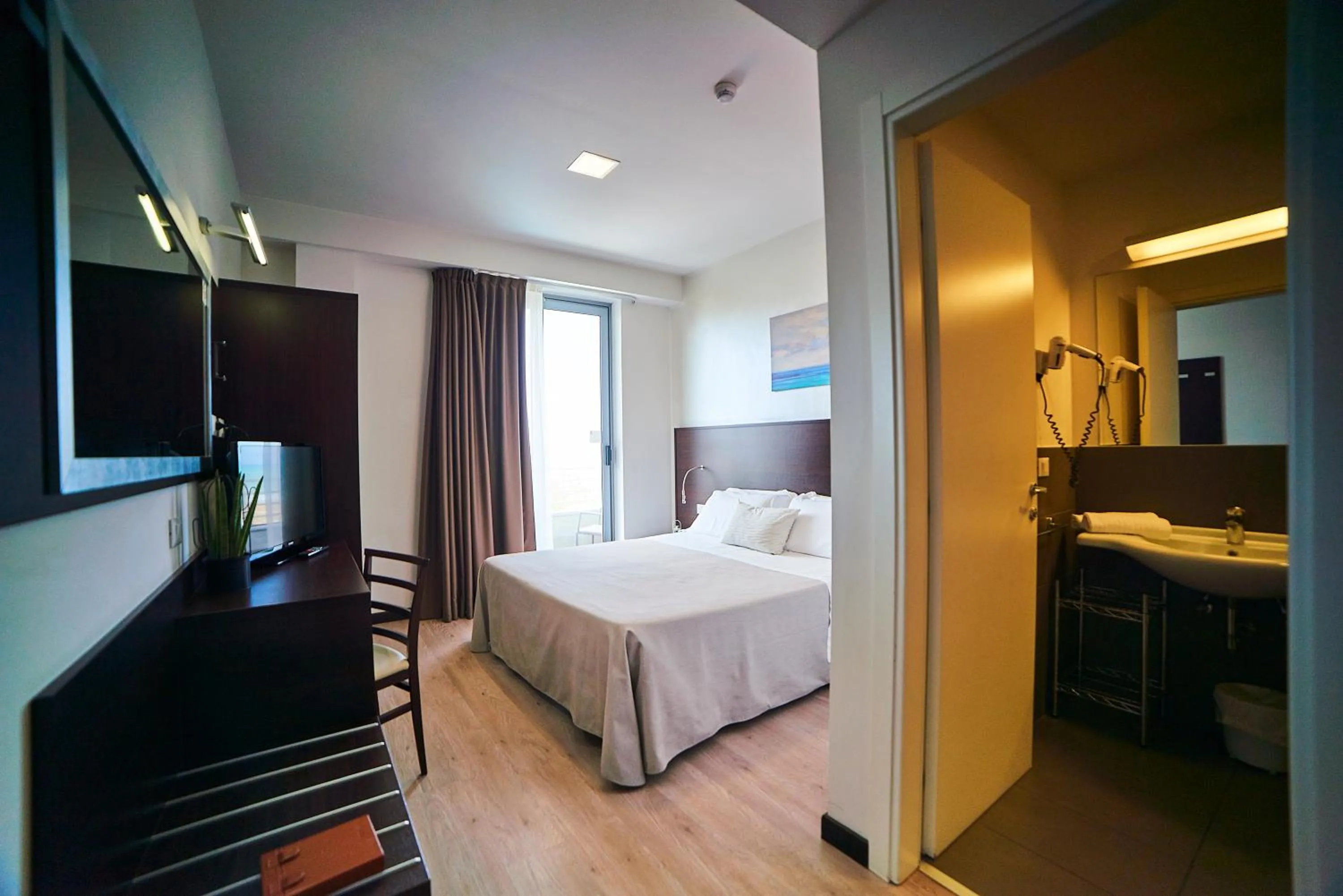 Bed in Alisei Palace Hotel