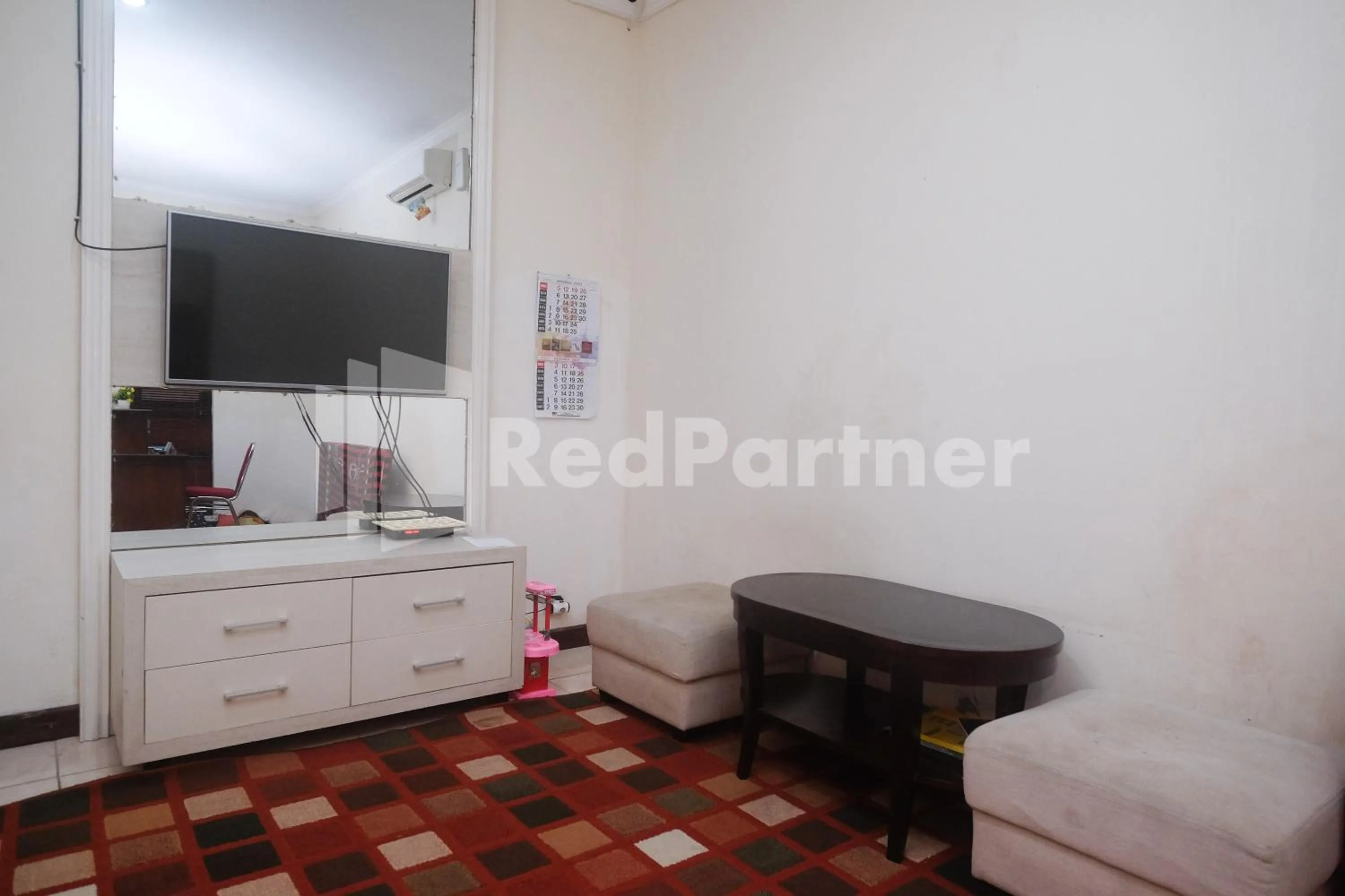 Bedroom in Tatti Inn Syariah Seturan RedPartner