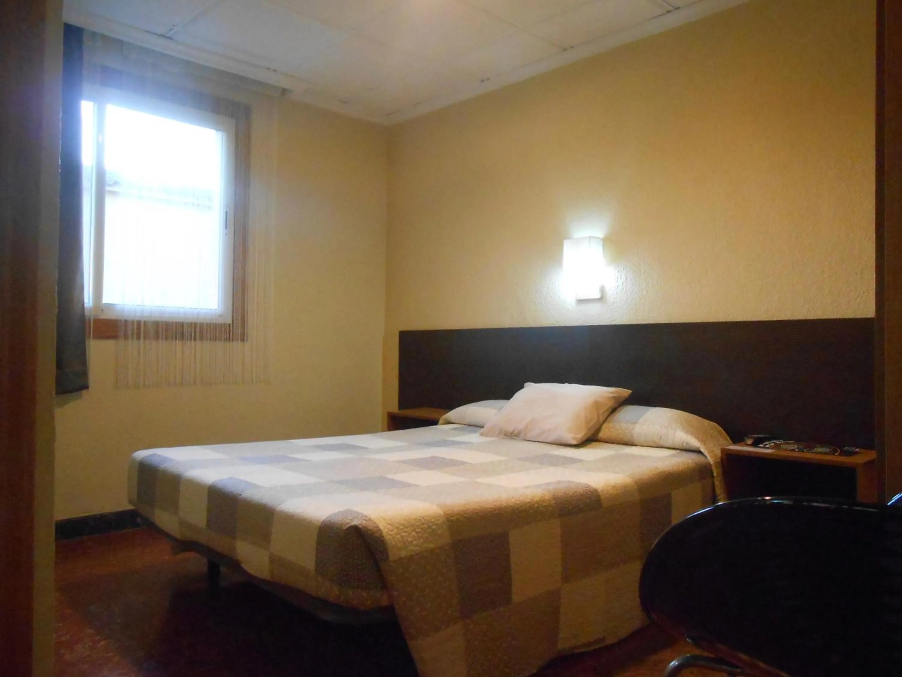 Bed in Hostal El Callejón