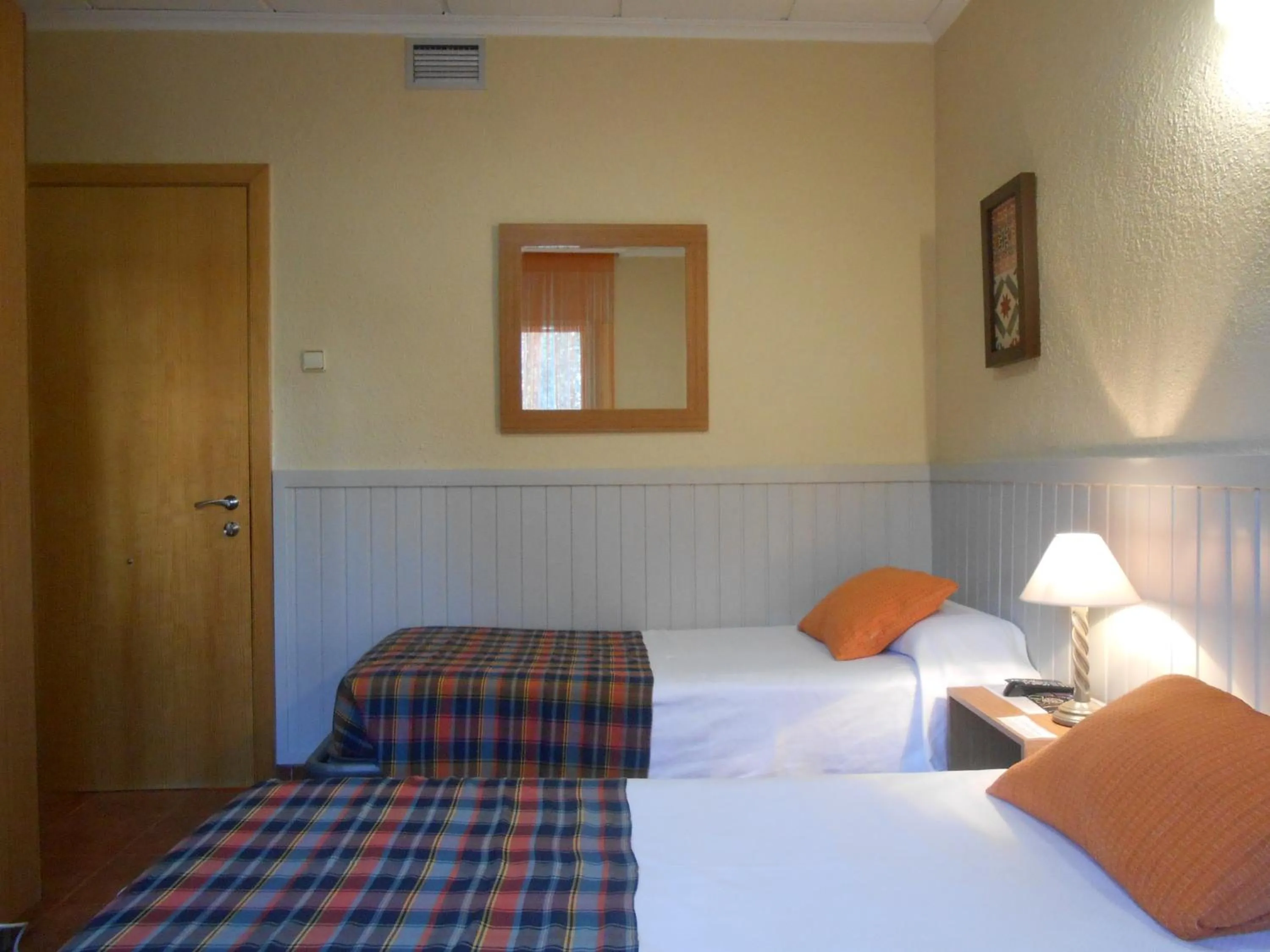 Bed in Hostal El Callejón