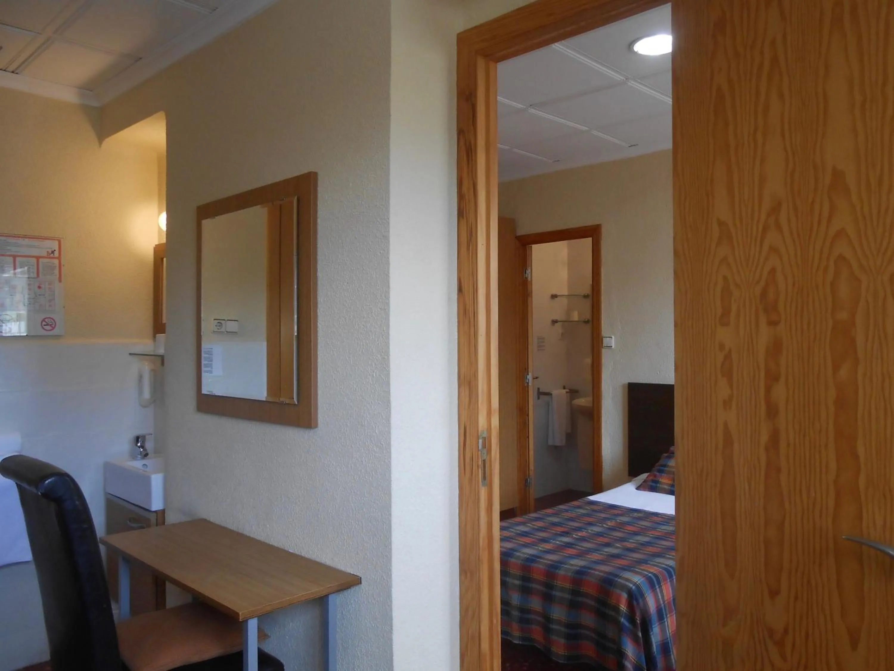 Bed in Hostal El Callejón