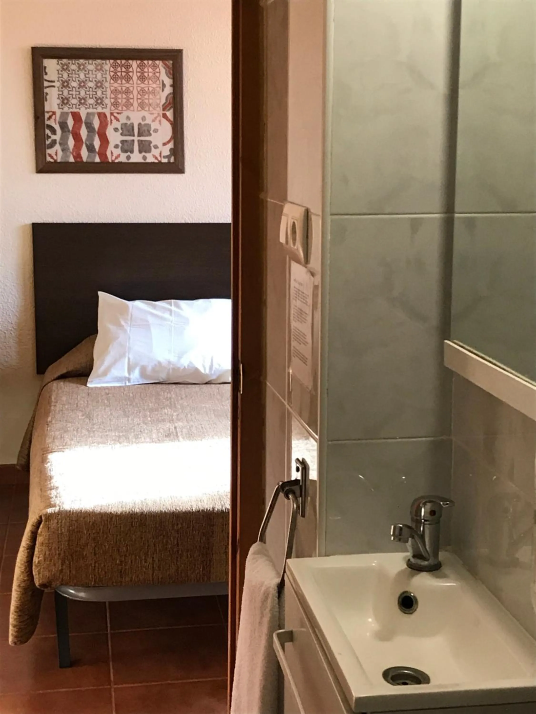 Bed in Hostal El Callejón