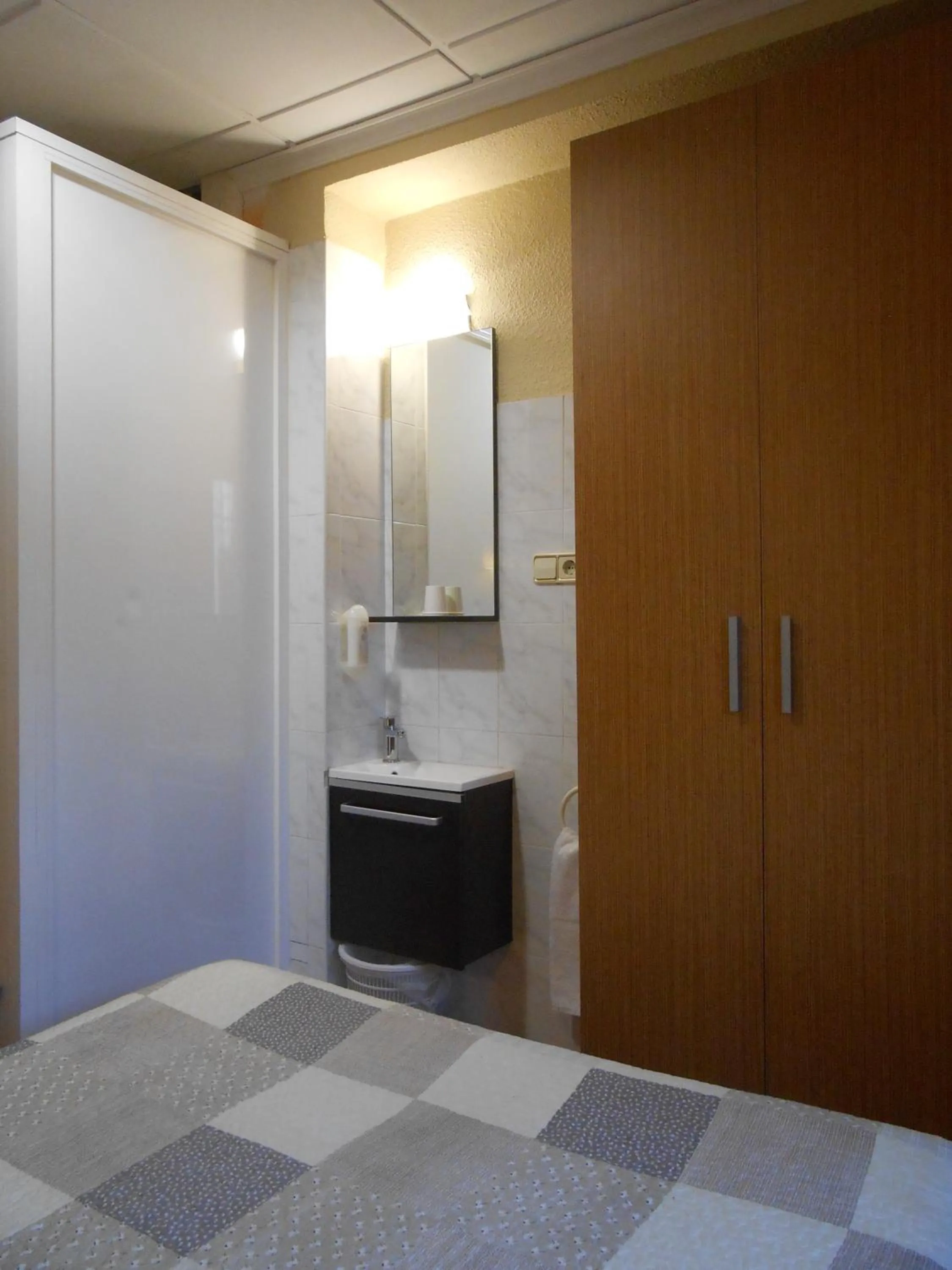 Bed in Hostal El Callejón